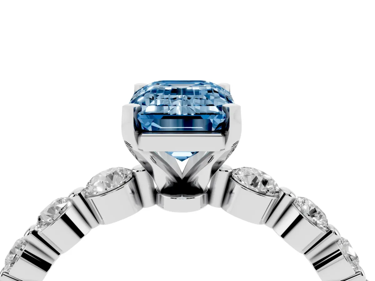 Fancy Blue Emerald Cut Solitaire Diamond Ring with Pave Band and Four-Prong Setting Silver