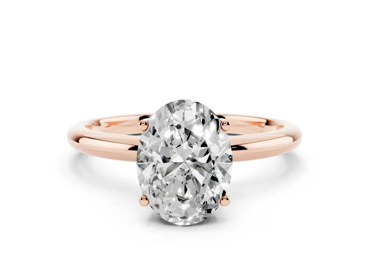 Oval Cut Cut Solitaire Engagement Ring with Four-Prong Setting and Classic Band Rose gold