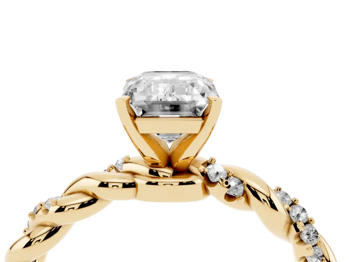 Emerald Cut Diamond Solitaire Ring with Twisted Band and Pavé Accents Yellow gold