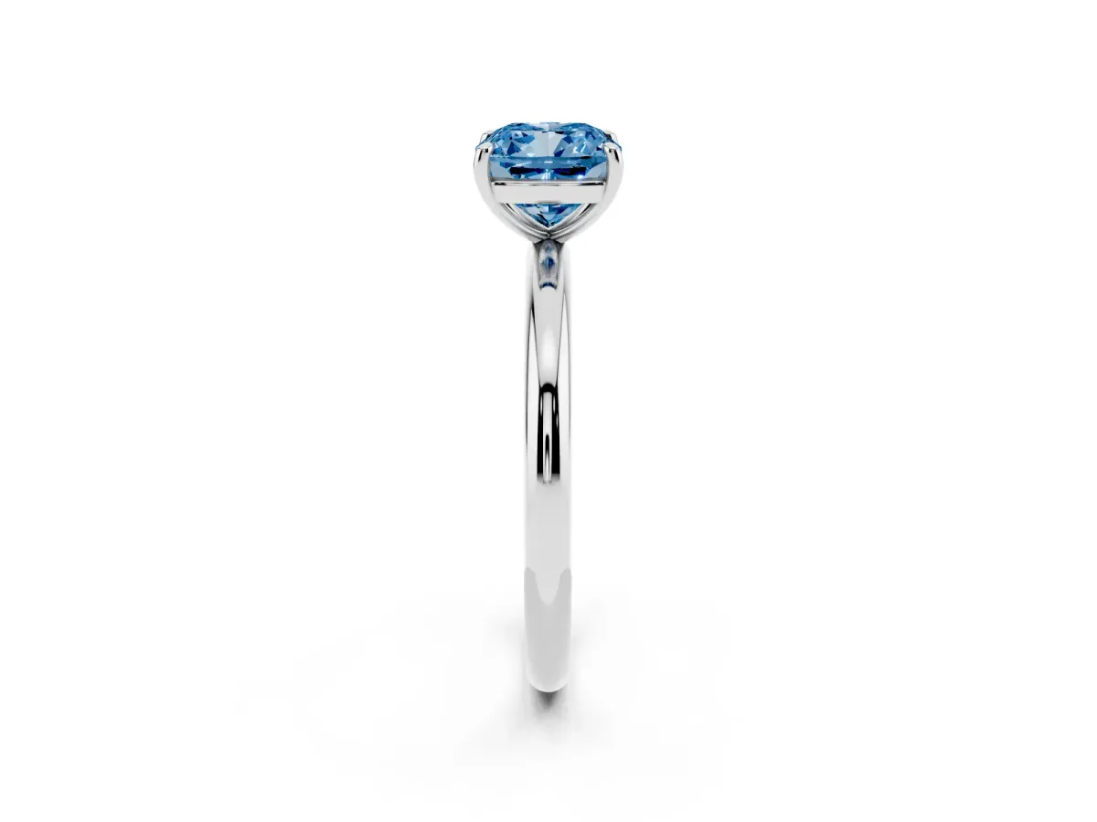 Fancy Blue Cushion Cut Solitaire Diamond Ring with Four-Prong Setting on a Plain Band White gold