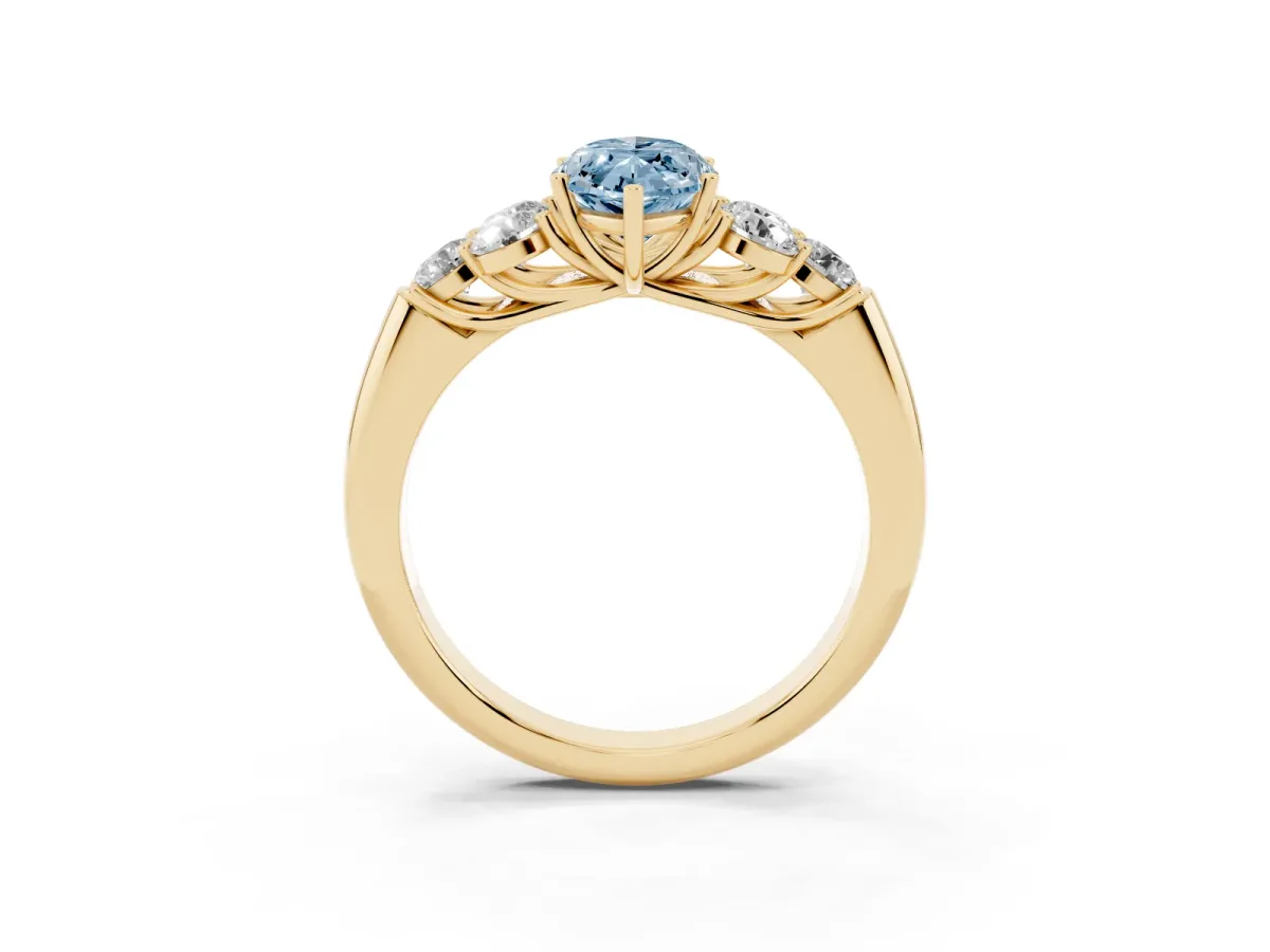 Fancy Blue Marquise Cut Cut Diamond Cluster Ring with Round Accent Stones and Prong Setting on a Classic Band Yellow gold