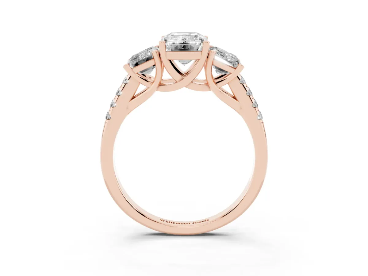 Three-Stone Emerald Cut Diamond Ring with Round Pavé Band and Prong Setting Rose gold