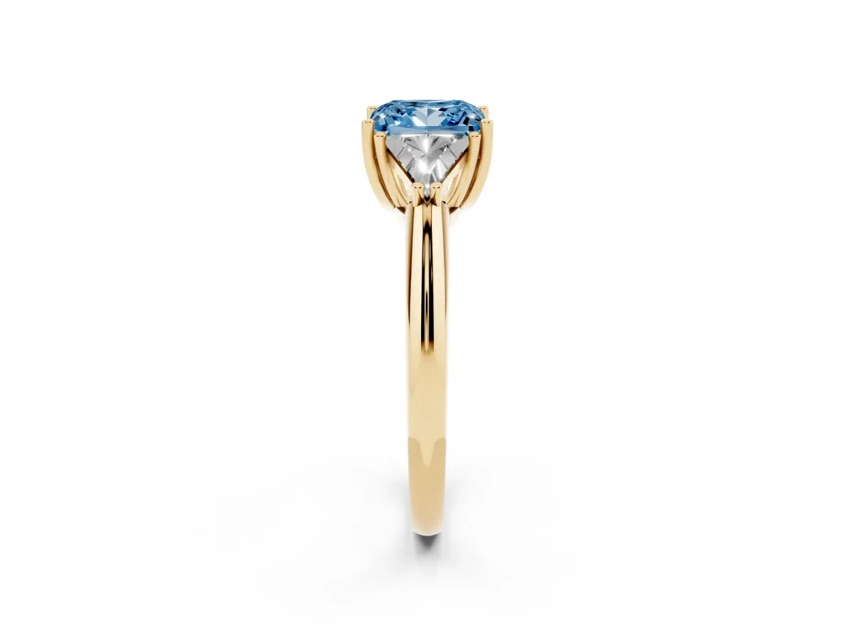 Fancy Blue Three-Stone Princess Cut Diamond Engagement Ring with Trillion Side Stones and Prong Setting Yellow gold