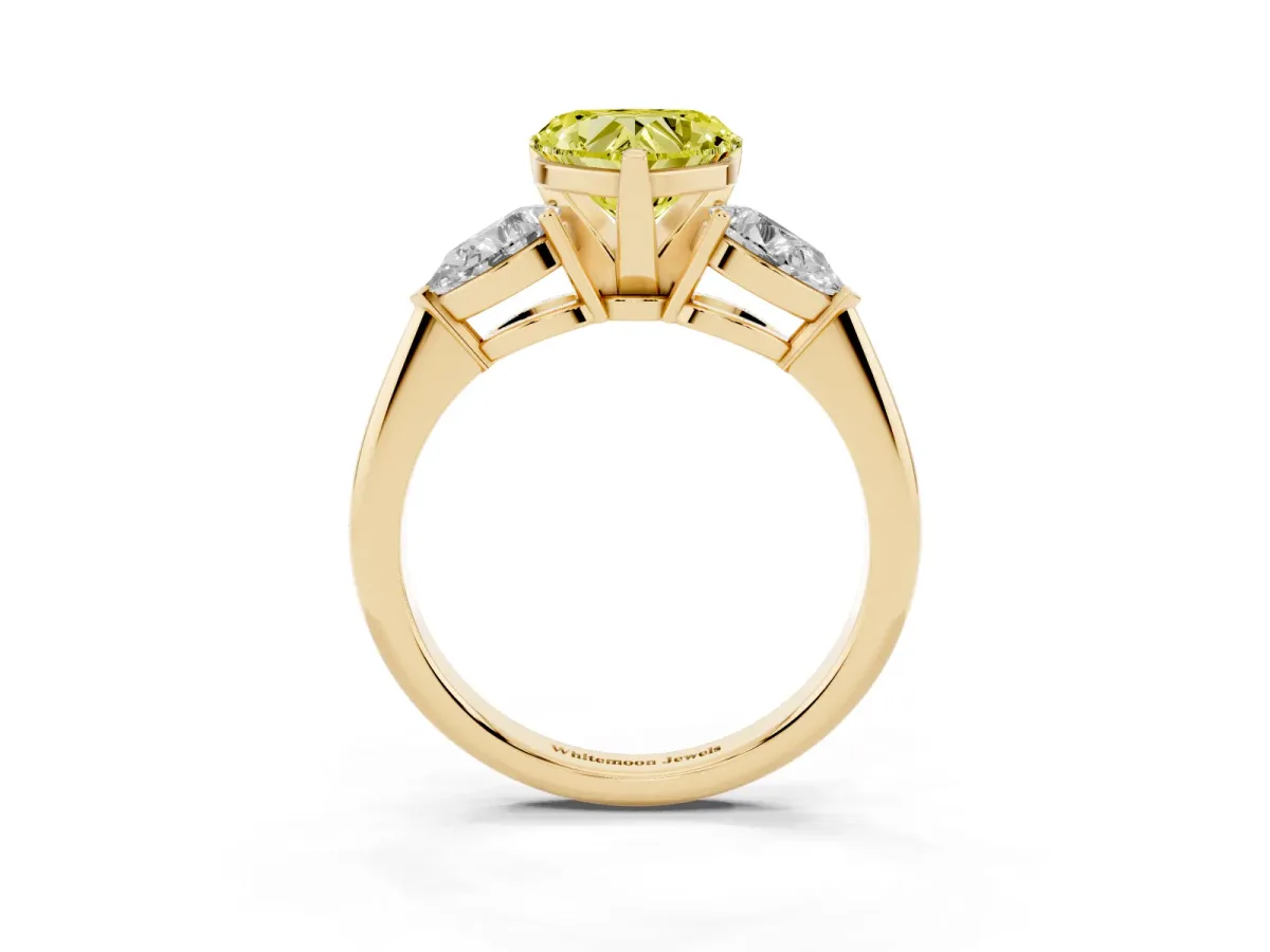 Fancy Yellow Three-Stone Heart Cut Diamond Ring with Pear Side Stones and Four-Prong Setting Yellow gold