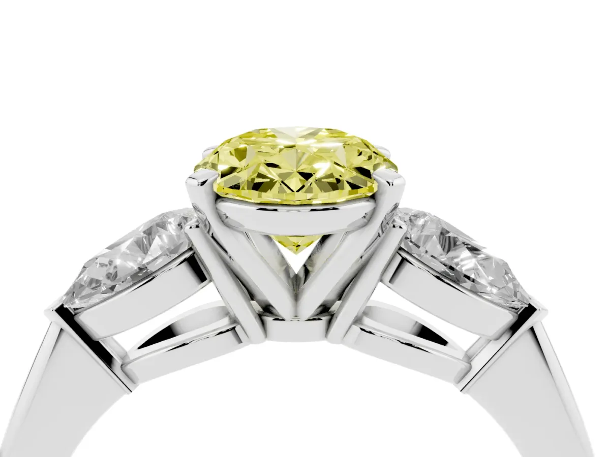 Fancy Yellow Three-Stone Oval Cut Diamond Ring with Pear Side Stones and Four-Prong Setting Platinum