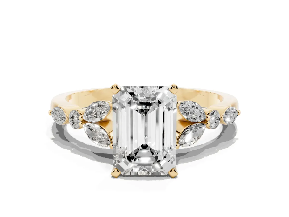 Emerald Cut Diamond Solitaire Ring with Side Stones and Four-Prong Setting Yellow gold