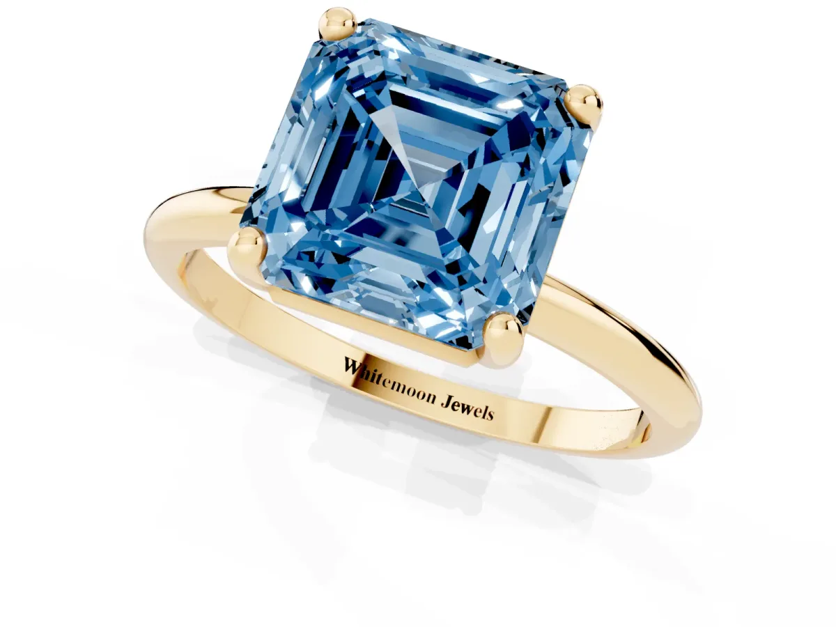 Fancy Blue Asscher Cut Solitaire Diamond Ring with 4-Prong Setting on a Classic Band Yellow gold