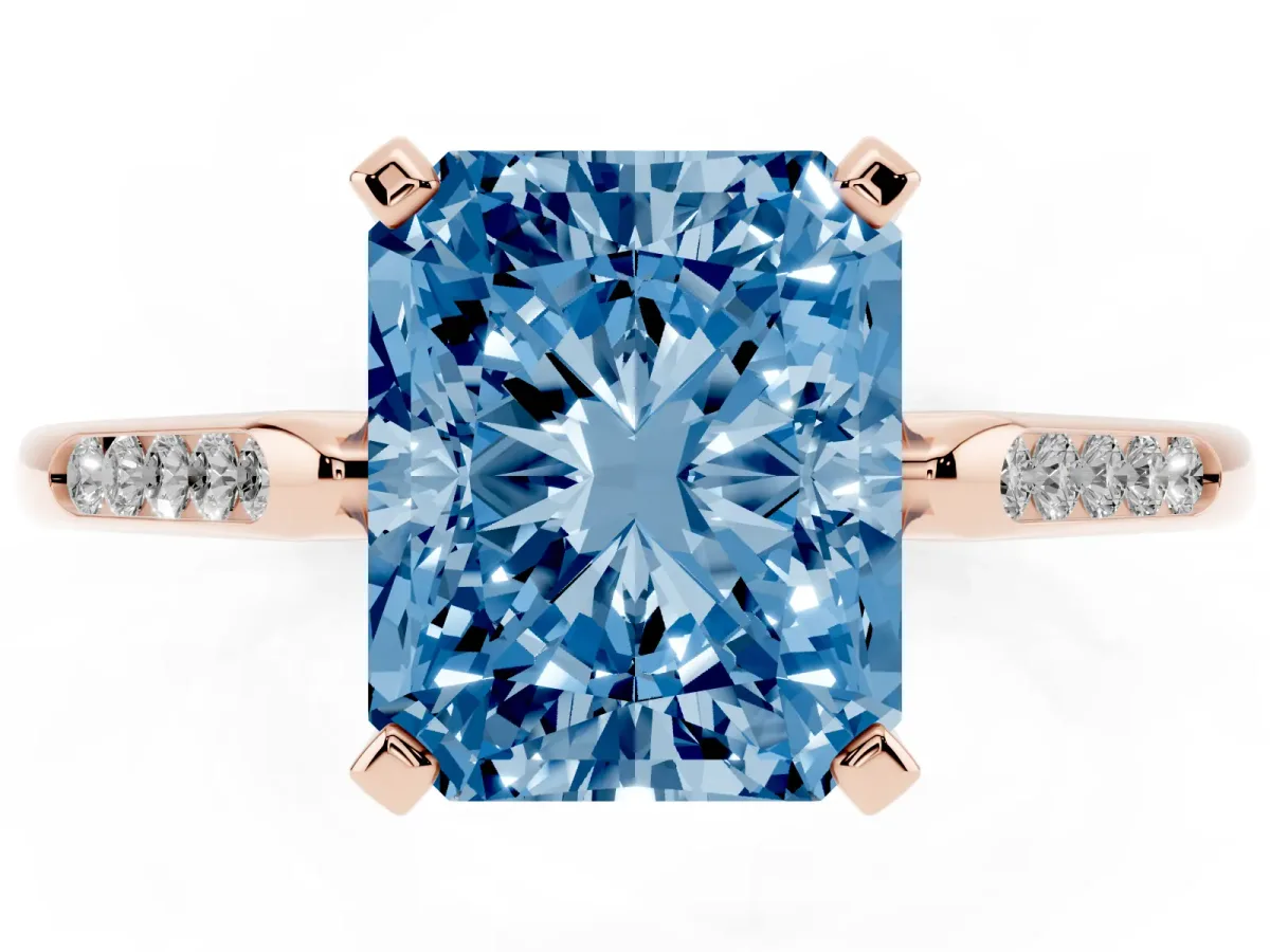 Fancy Blue Radiant Cut Diamond Solitaire Ring with Channel Set Round Band and Prong Setting Rose gold