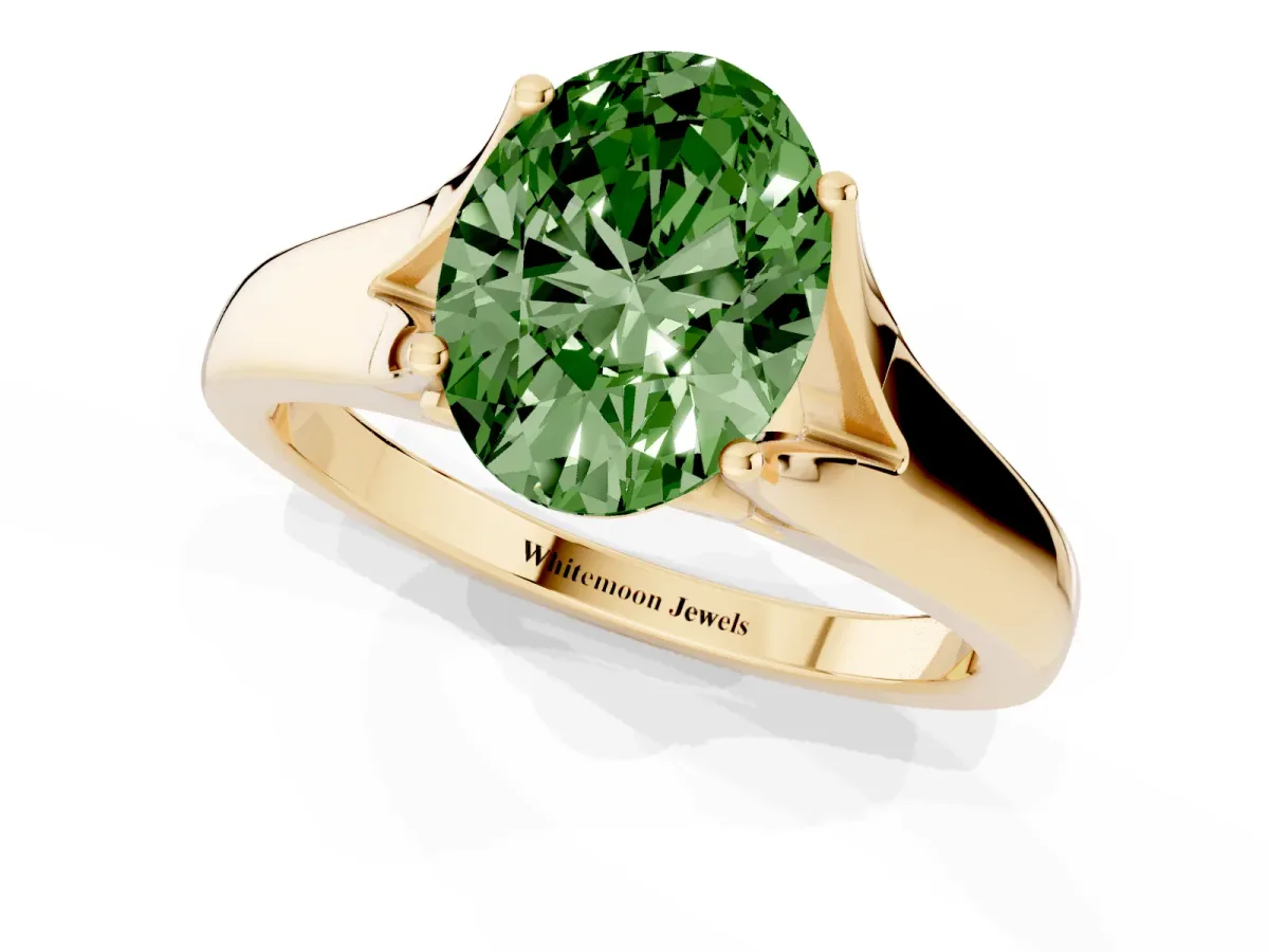 Fancy Green Oval Cut Solitaire Diamond Ring with Cathedral Band and Four-Prong Setting Yellow gold