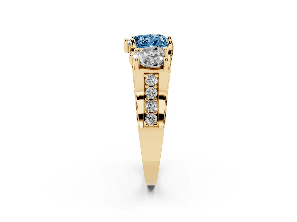 Fancy Blue Heart Cut Diamond Three-Stone Ring with Channel Set Band and Four-Prong Setting Yellow gold