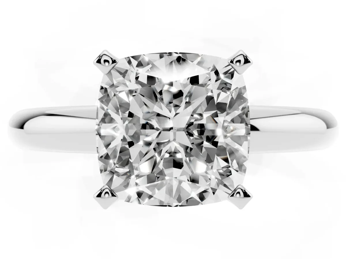 Cushion Cut Diamond Solitaire Engagement Ring with Round Band and Four-Prong Setting Silver