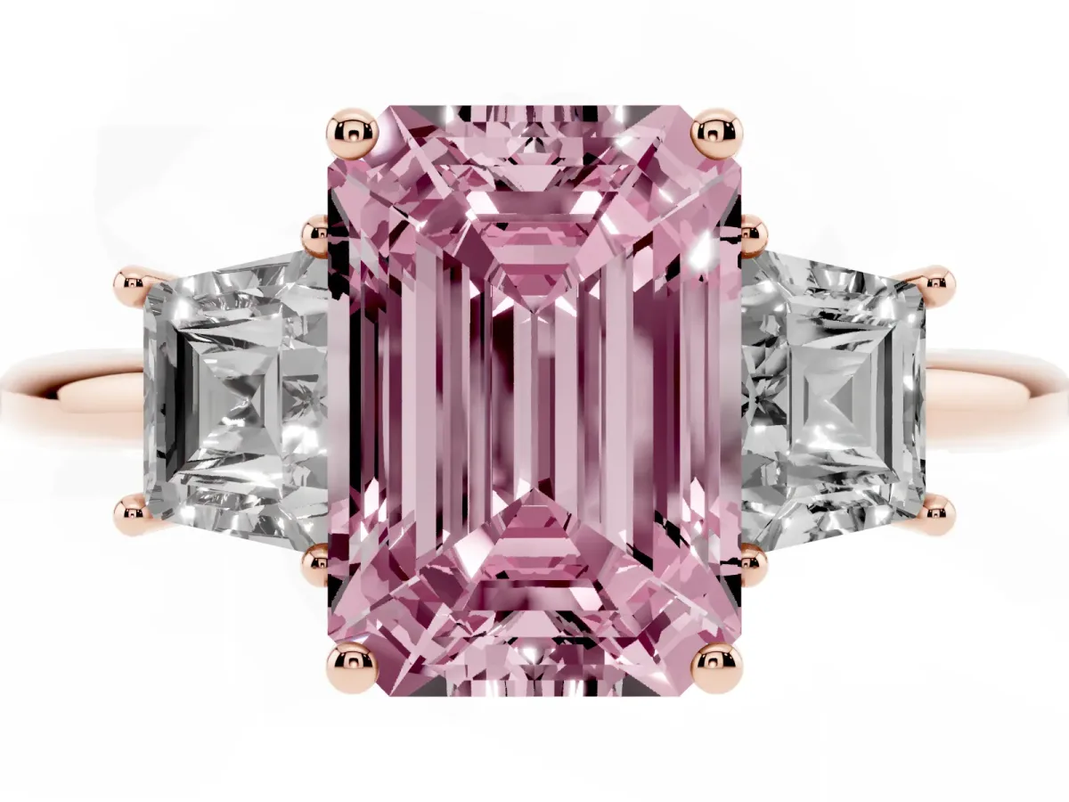 Fancy Pink Emerald Cut Diamond Three-Stone Ring with Trapezoid Side Stones and Prong Setting Rose gold