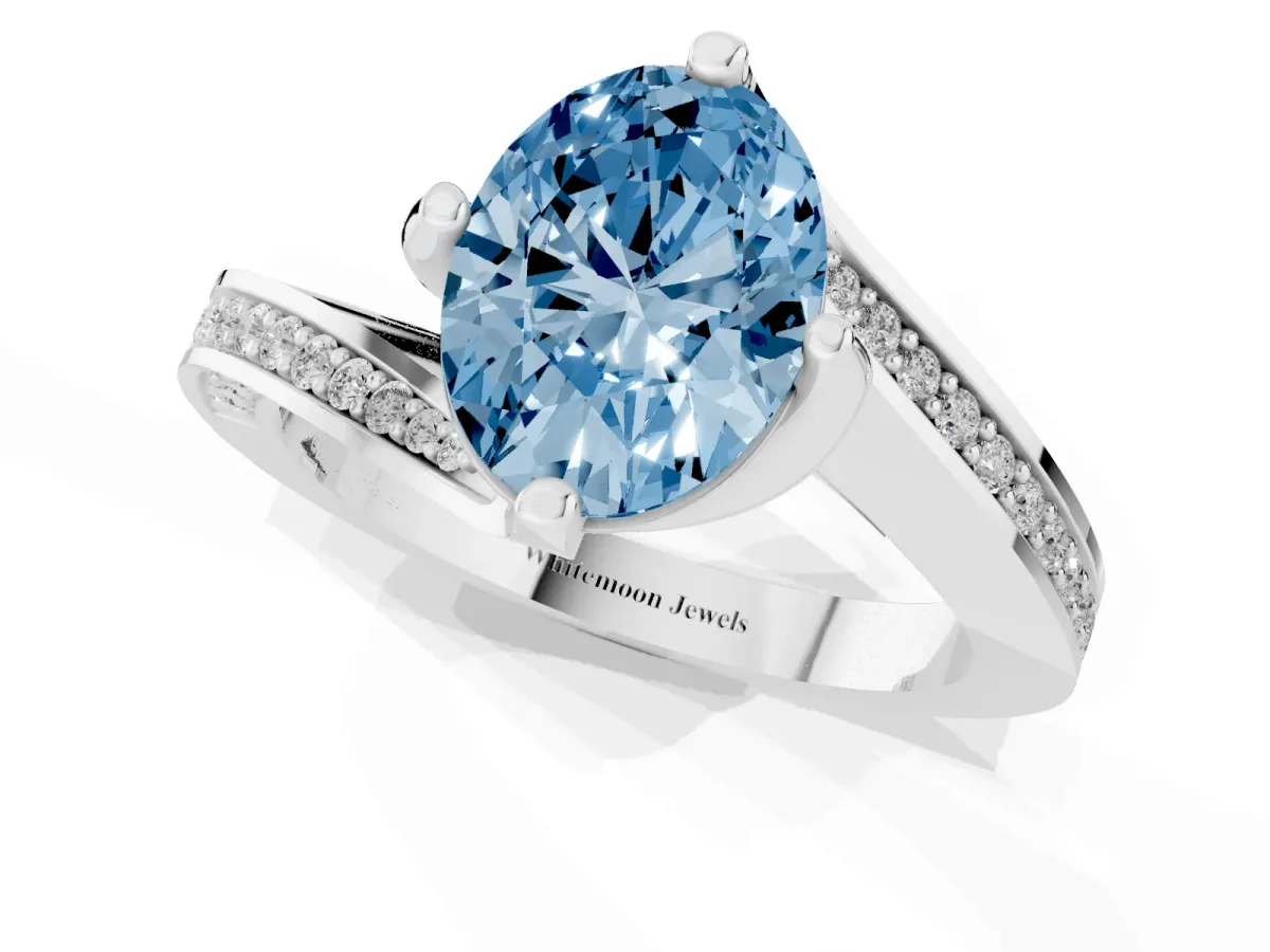 Fancy Blue Oval Cut Solitaire Diamond Twist Band with Pavé Setting and Four-Prong Setting Silver