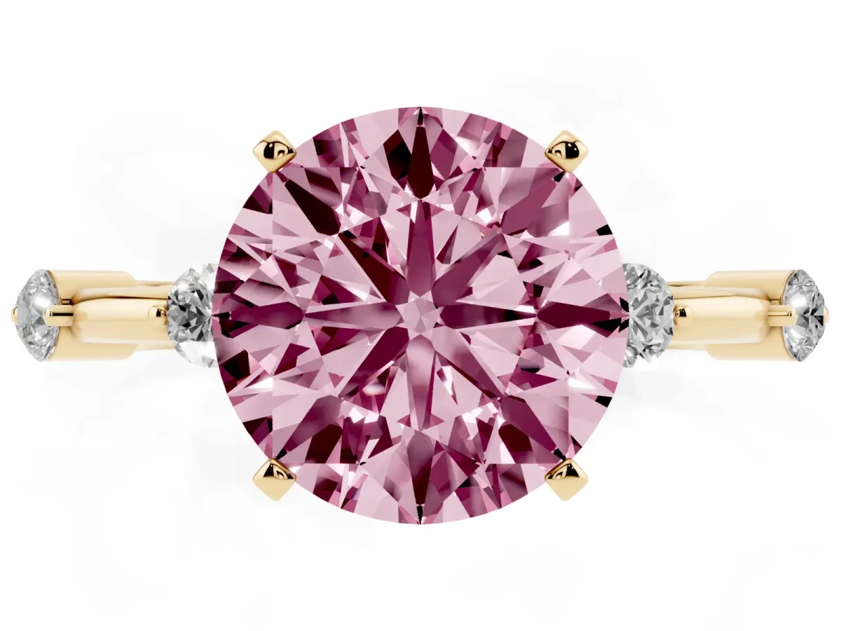 Fancy Pink Round Cut Solitaire Diamond Ring with Bezel Set Side Stones and Prong Setting Yellow gold