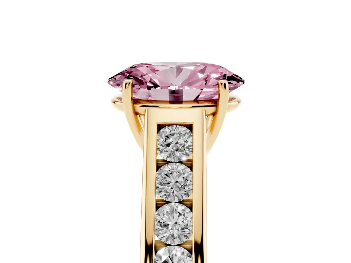 Fancy Pink Oval Cut Brilliant Channel-Set Solitaire Ring with Four-Prong Setting Yellow gold