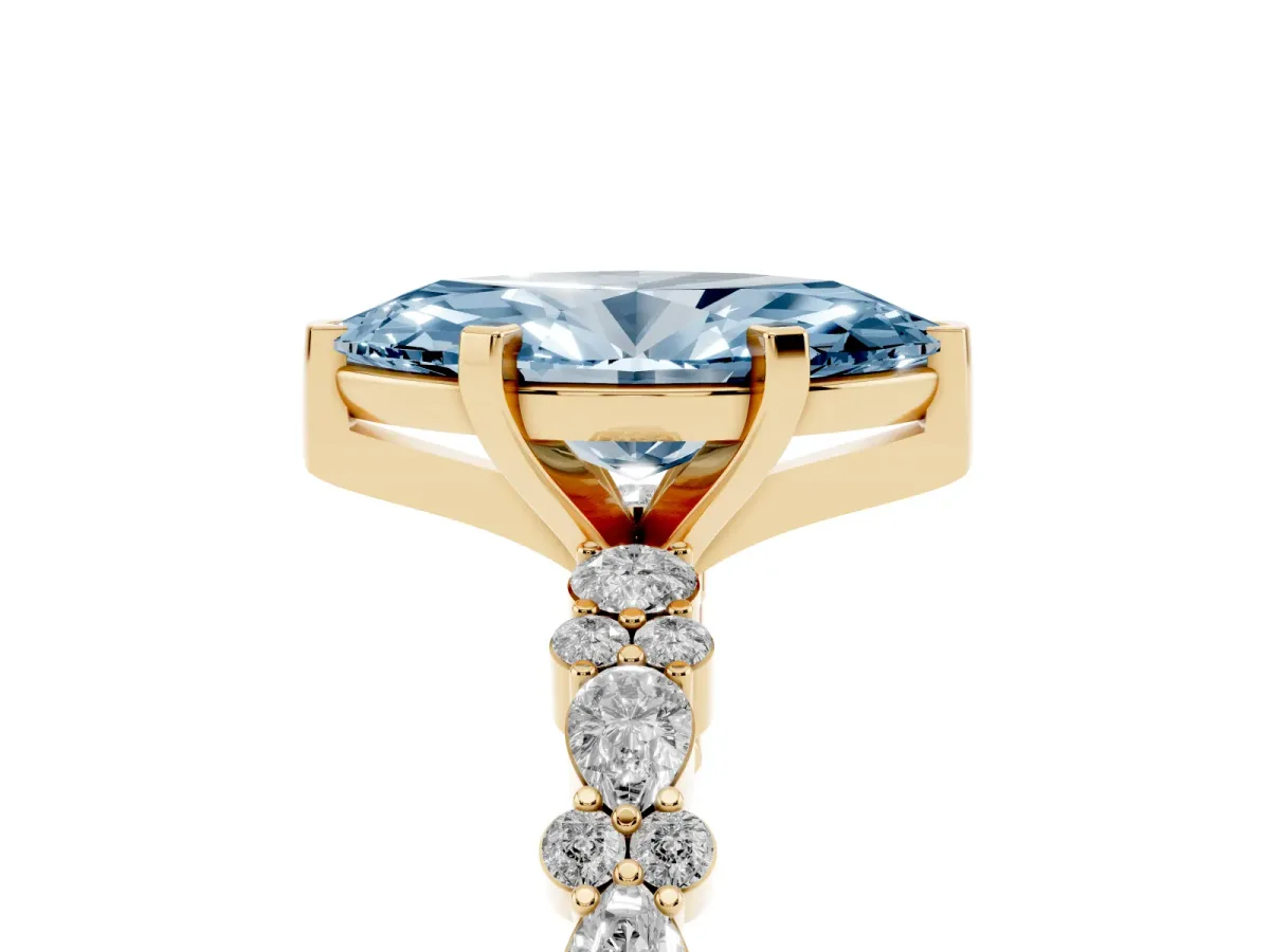 Fancy Blue Marquise Cut Diamond Side Stone Solitaire Ring with Round and Four-Prong Setting Yellow gold