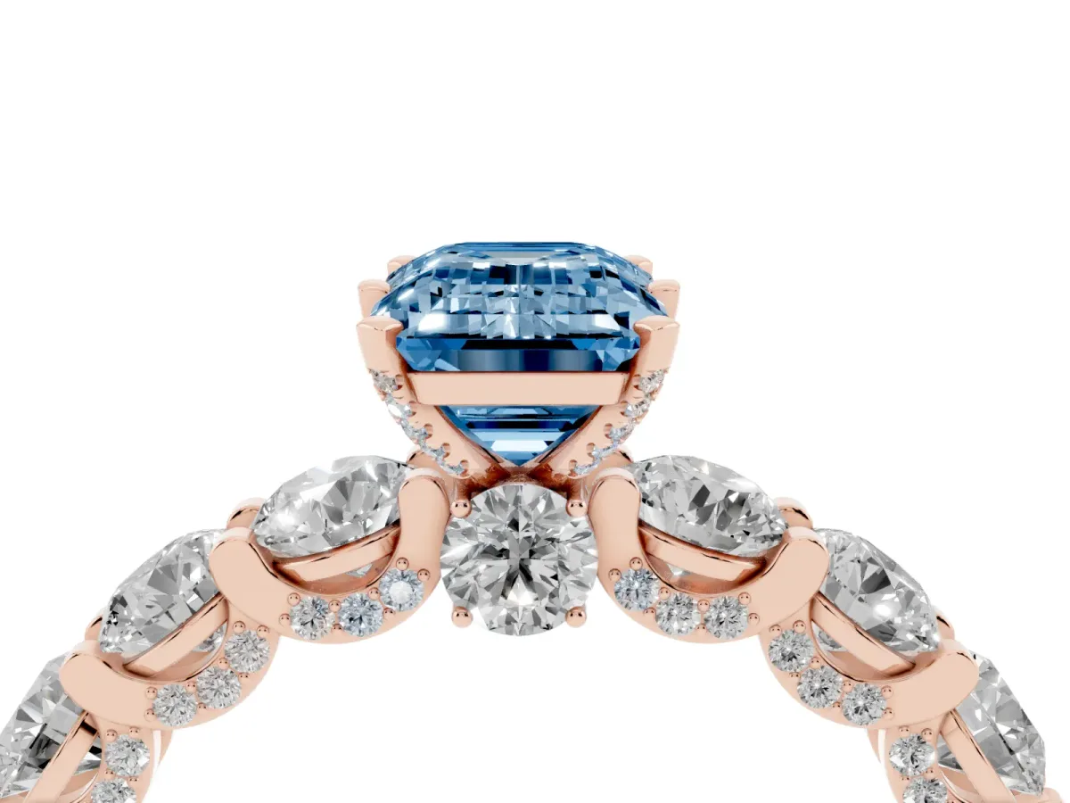 Fancy Blue Emerald Cut Diamond Side Stone Engagement Ring with Four-Prong Setting Rose gold
