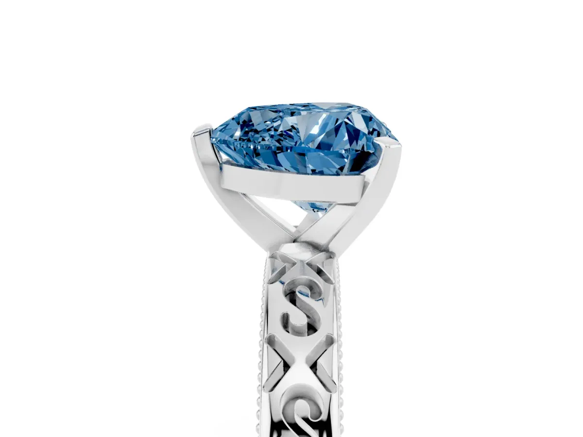Fancy Blue Heart Cut Solitaire Engagement Ring with Scrollwork Band and Four-Prong Setting White gold