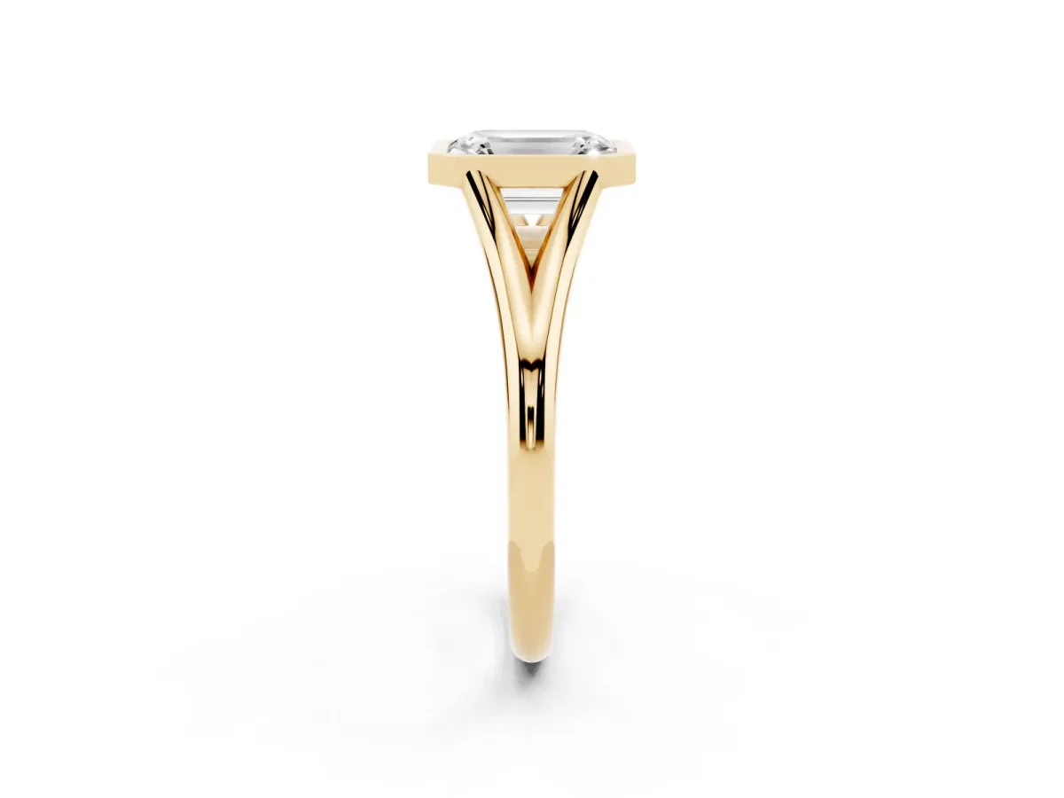 Bezel Set Emerald Cut Cut Solitaire Ring with Tapered Band Yellow gold