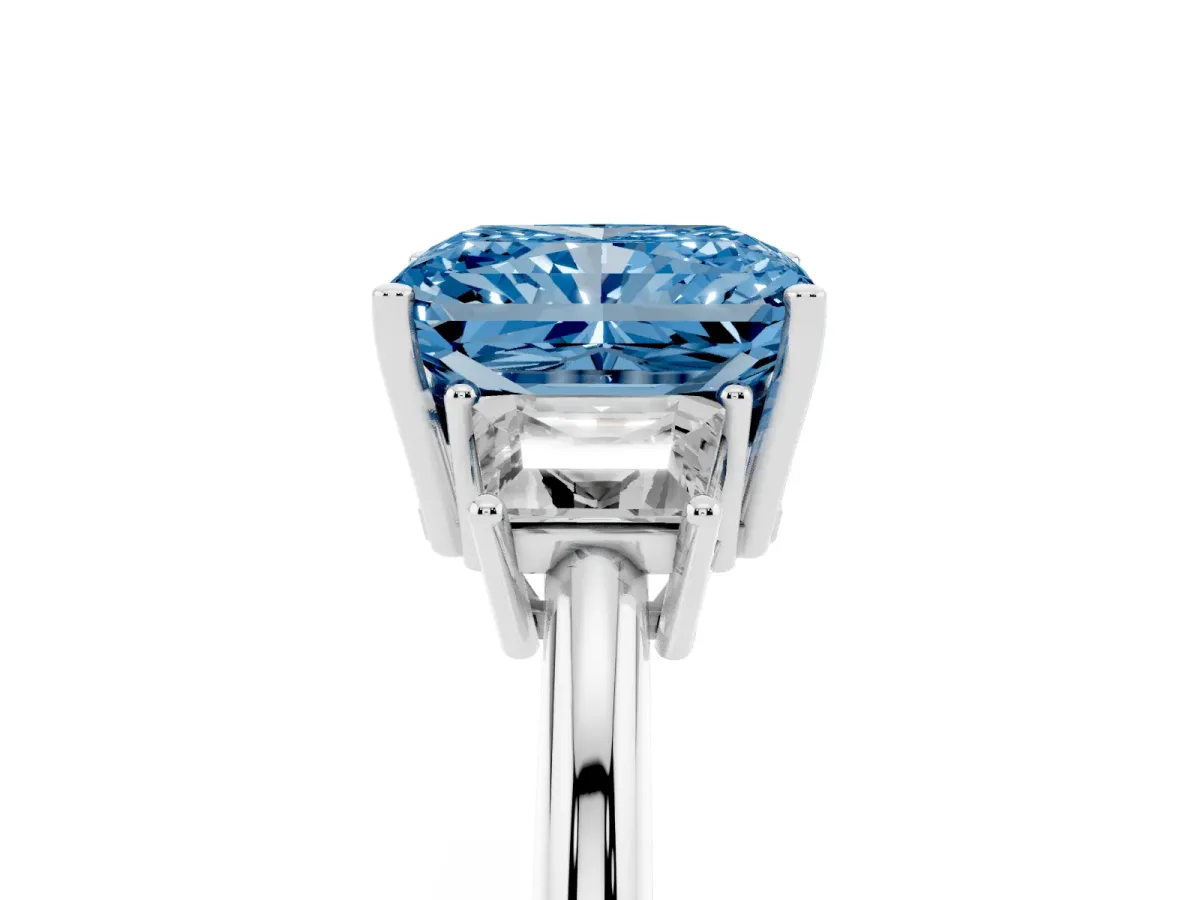 Fancy Blue Radiant Cut Diamond Three-Stone Ring with Trapezoid Side Stones and Prong Setting Silver