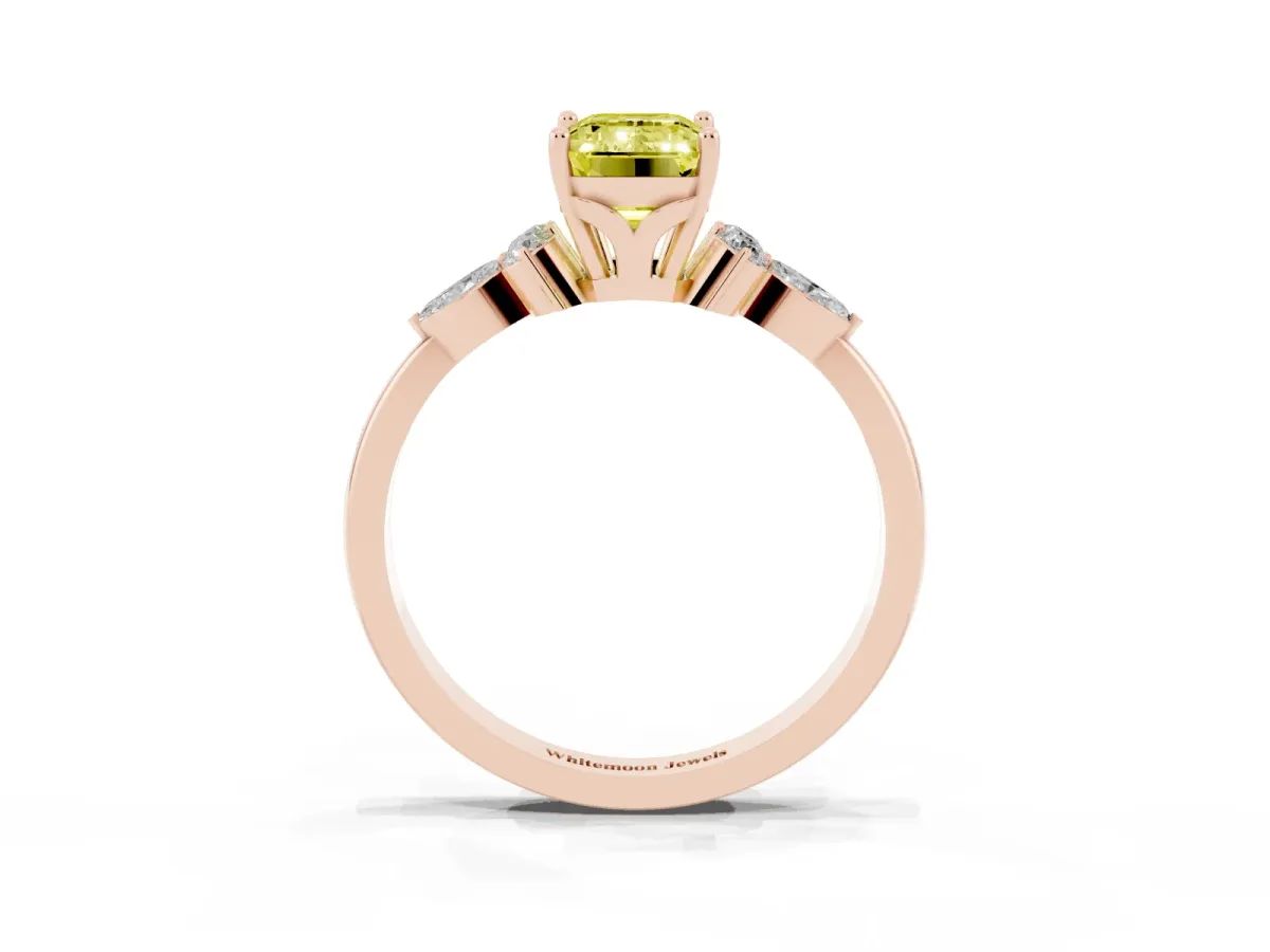 Fancy Yellow Emerald Cut Brilliant Diamond Solitaire Ring with Pear Side Stones and Four-Prong Setting Rose gold