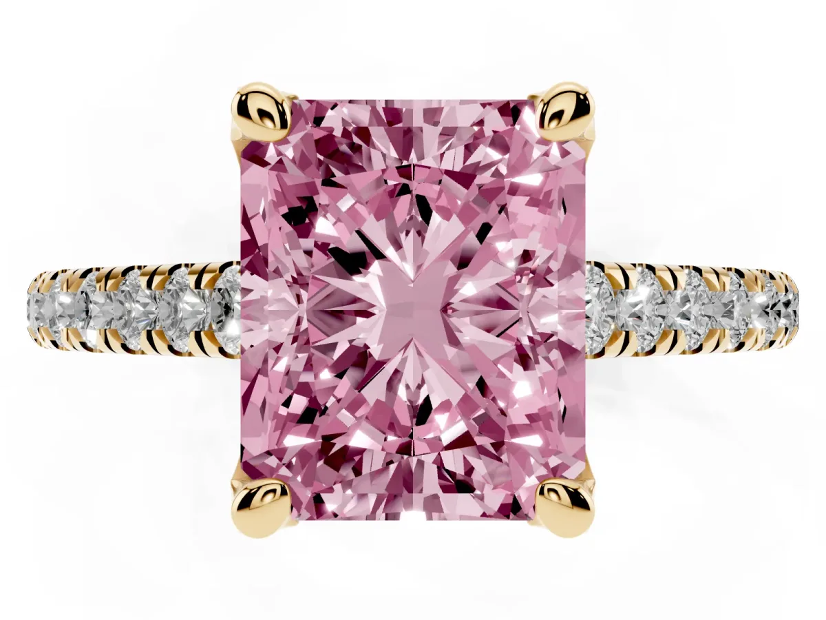 Fancy Pink Radiant Cut Brilliant Diamond Solitaire with Pavé Band and Four-Prong Setting Yellow gold