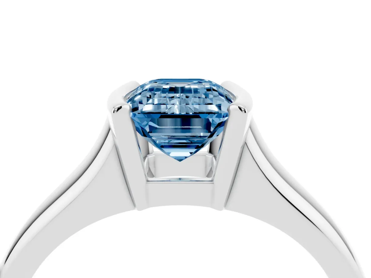 Fancy Blue Emerald Cut Solitaire Tension Set Diamond Ring with Split Shank Band Silver