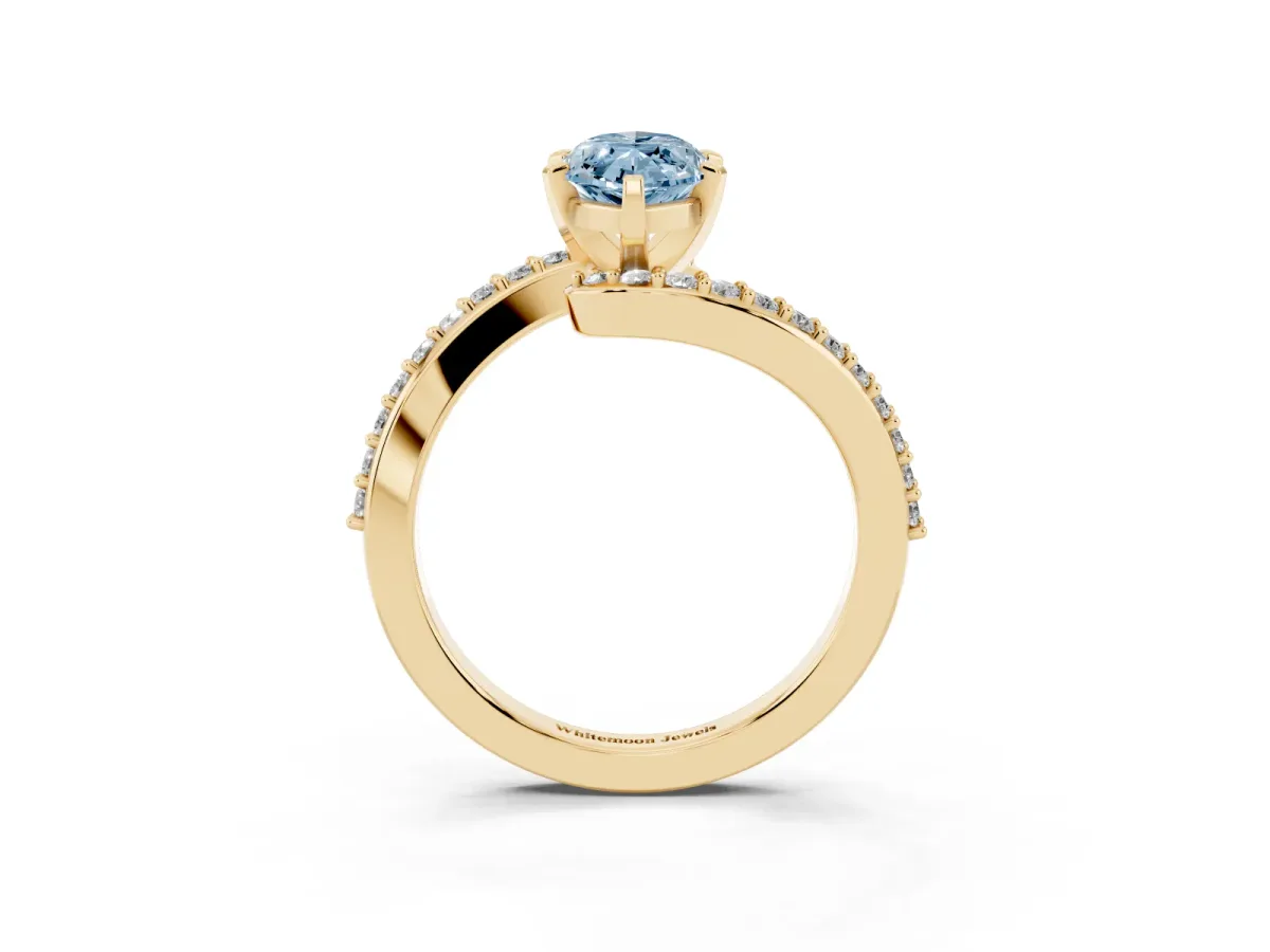 Fancy Blue Marquise Cut Solitaire Twist Band with Pave Set Diamonds and Four-Prong Setting Yellow gold