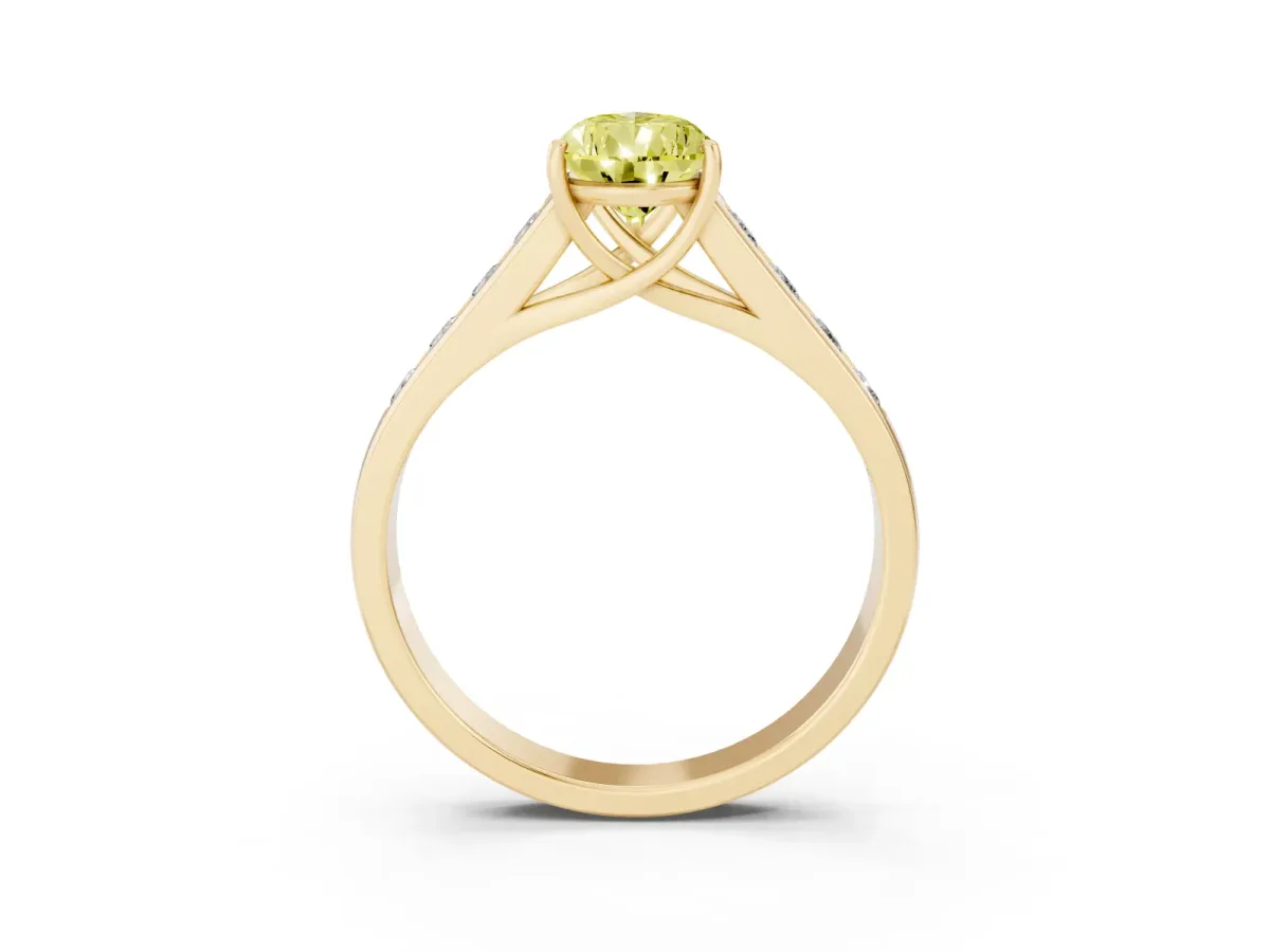 Fancy Yellow Pear Cut Brilliant Channel-Set Solitaire Ring with Four-Prong Setting Yellow gold