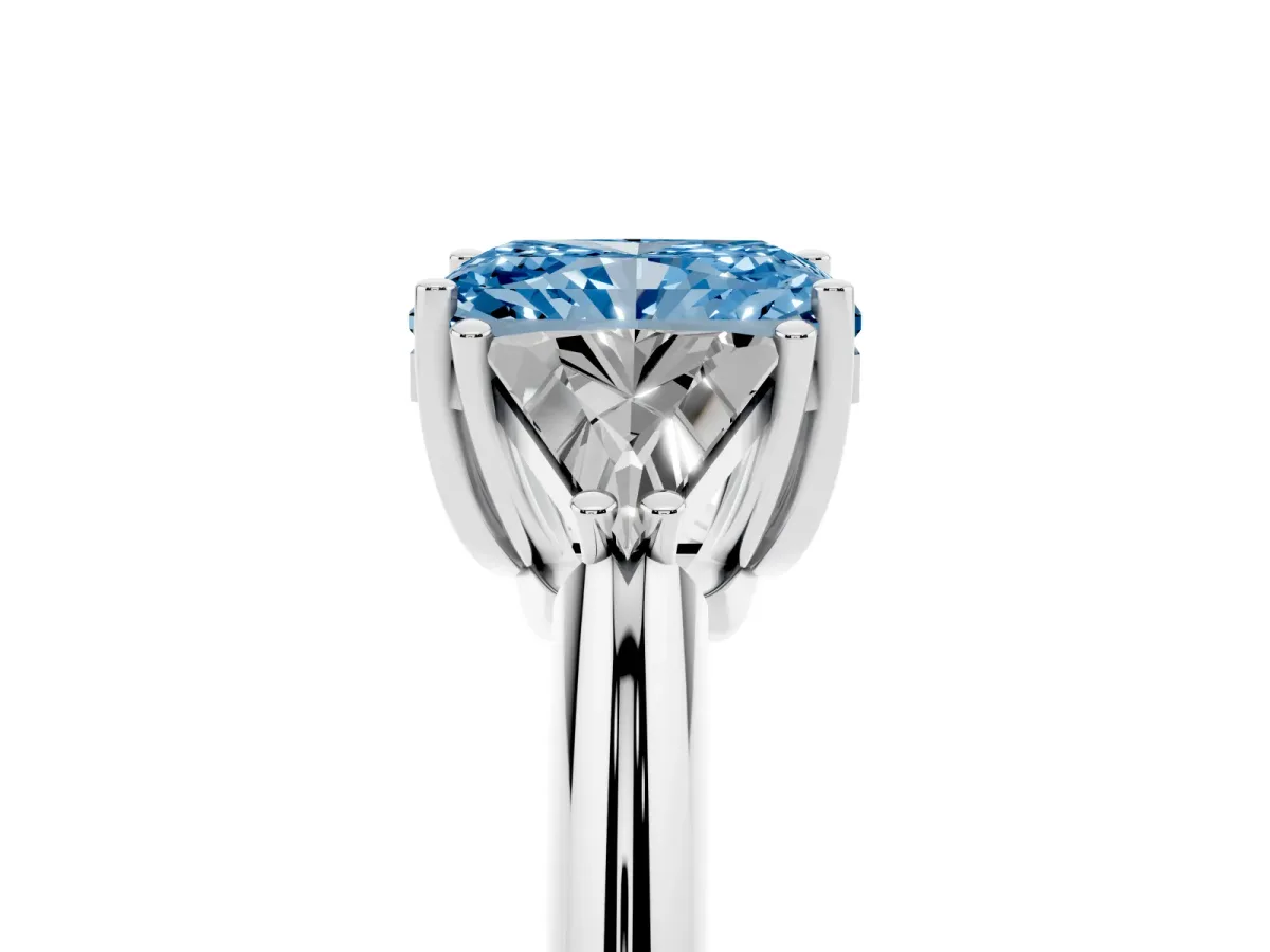 Fancy Blue Three-Stone Radiant Cut Diamond Engagement Ring with Trillion Side Stones and Prong Setting Silver