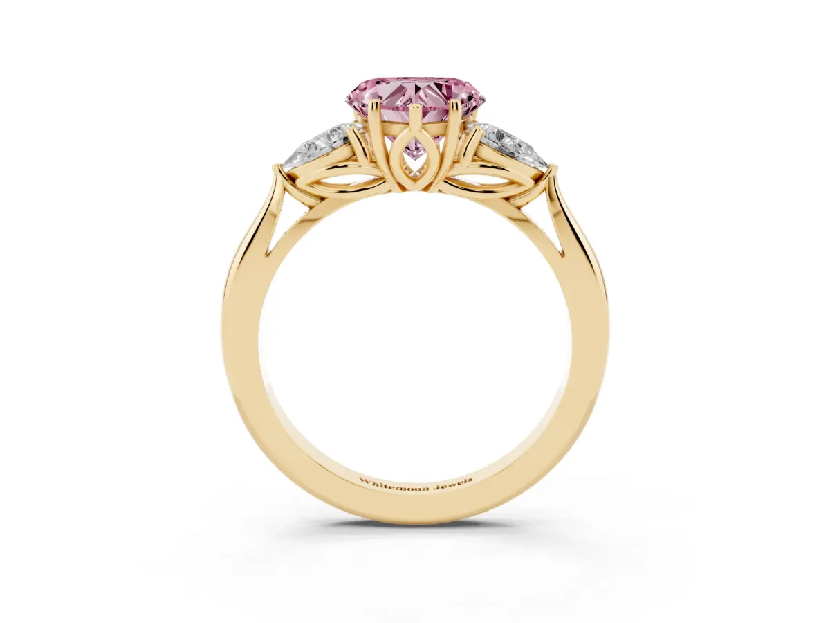 Fancy Pink Heart Cut Diamond Three-Stone Ring with Pear Side Stones and Prong Setting Yellow gold
