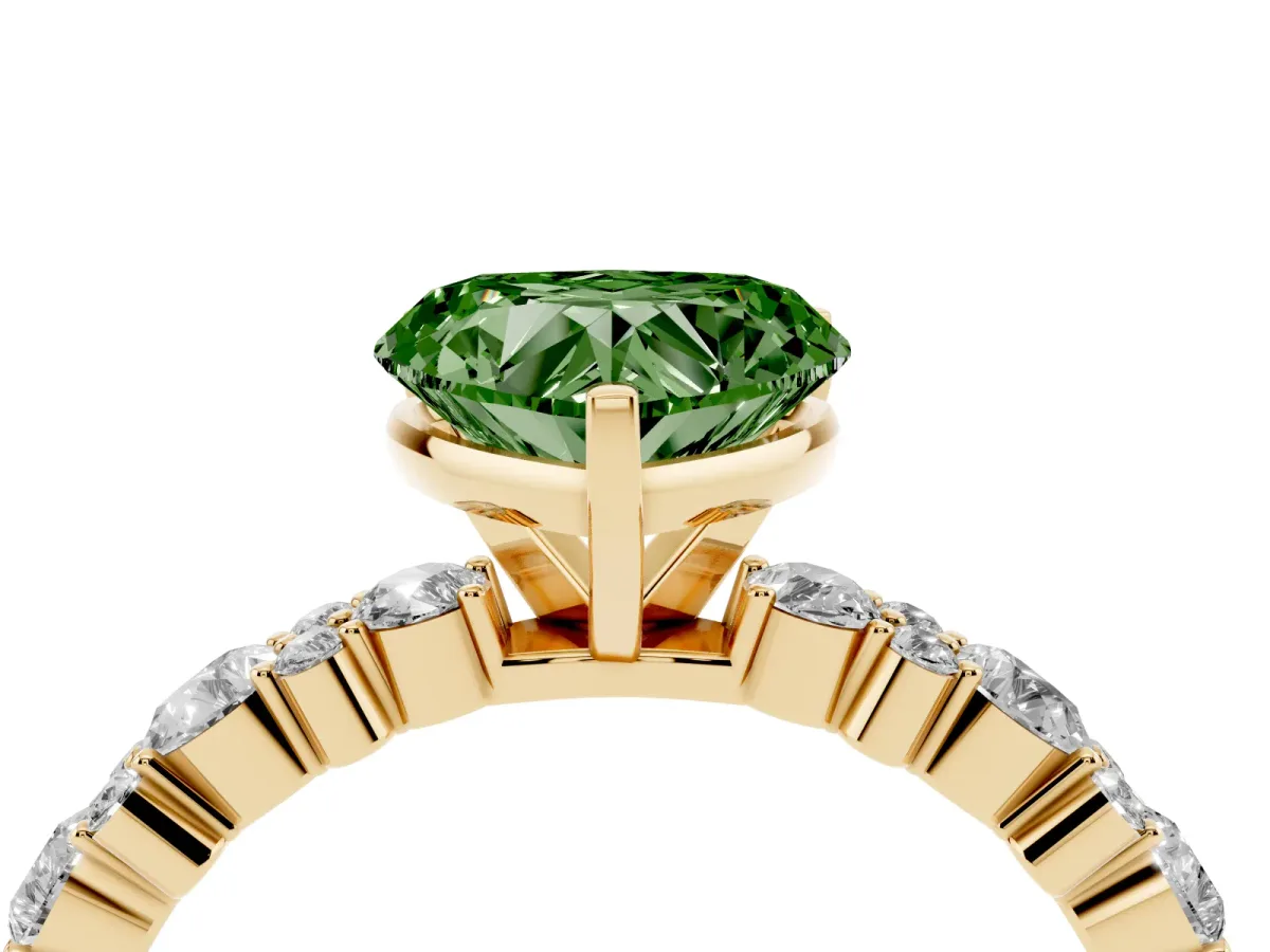 Fancy Green Heart Cut Diamond Side Stone Solitaire Ring with Round and Four-Prong Setting Yellow gold