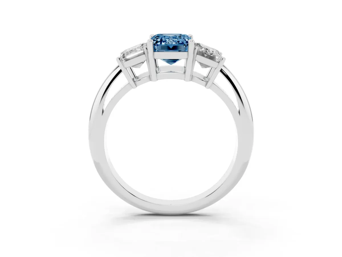 Fancy Blue Three-Stone Emerald Cut Cut Diamond Engagement Ring with Prong Setting on a White Gold Band White gold