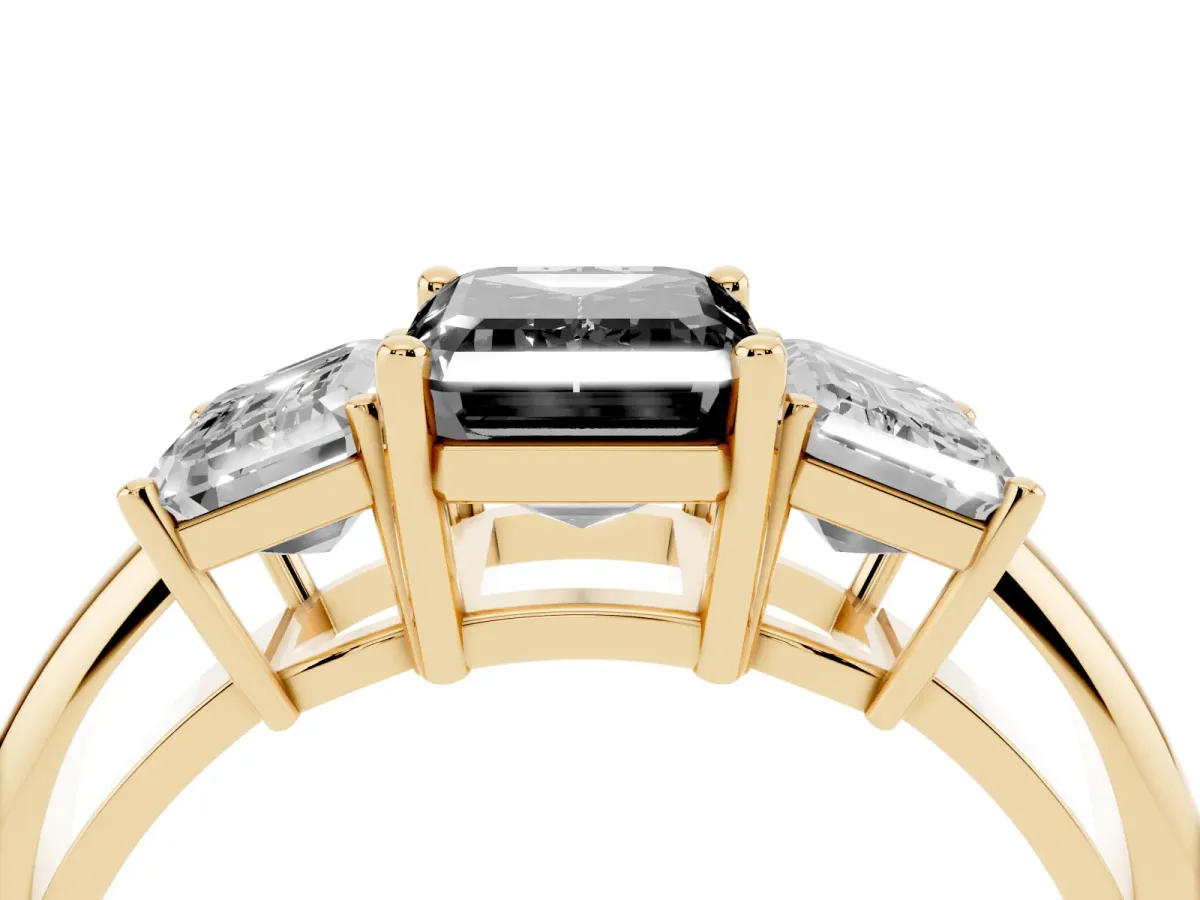 Fancy Black Three-Stone Emerald Cut Cut Diamond Engagement Ring with Prong Setting on a White Gold Band Yellow gold