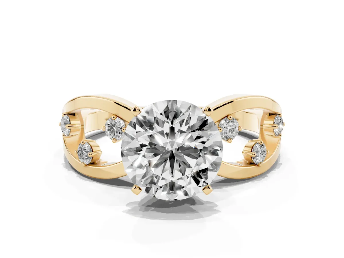 Round Cut Cut Solitaire Diamond with Side Stones on Criss-Cross Band and Four-Prong Setting Yellow gold