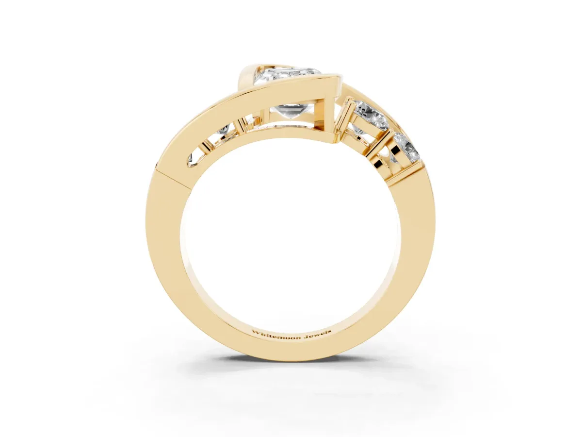 Bezel Set Emerald Cut Diamond Bypass Ring with Round Accents Yellow gold