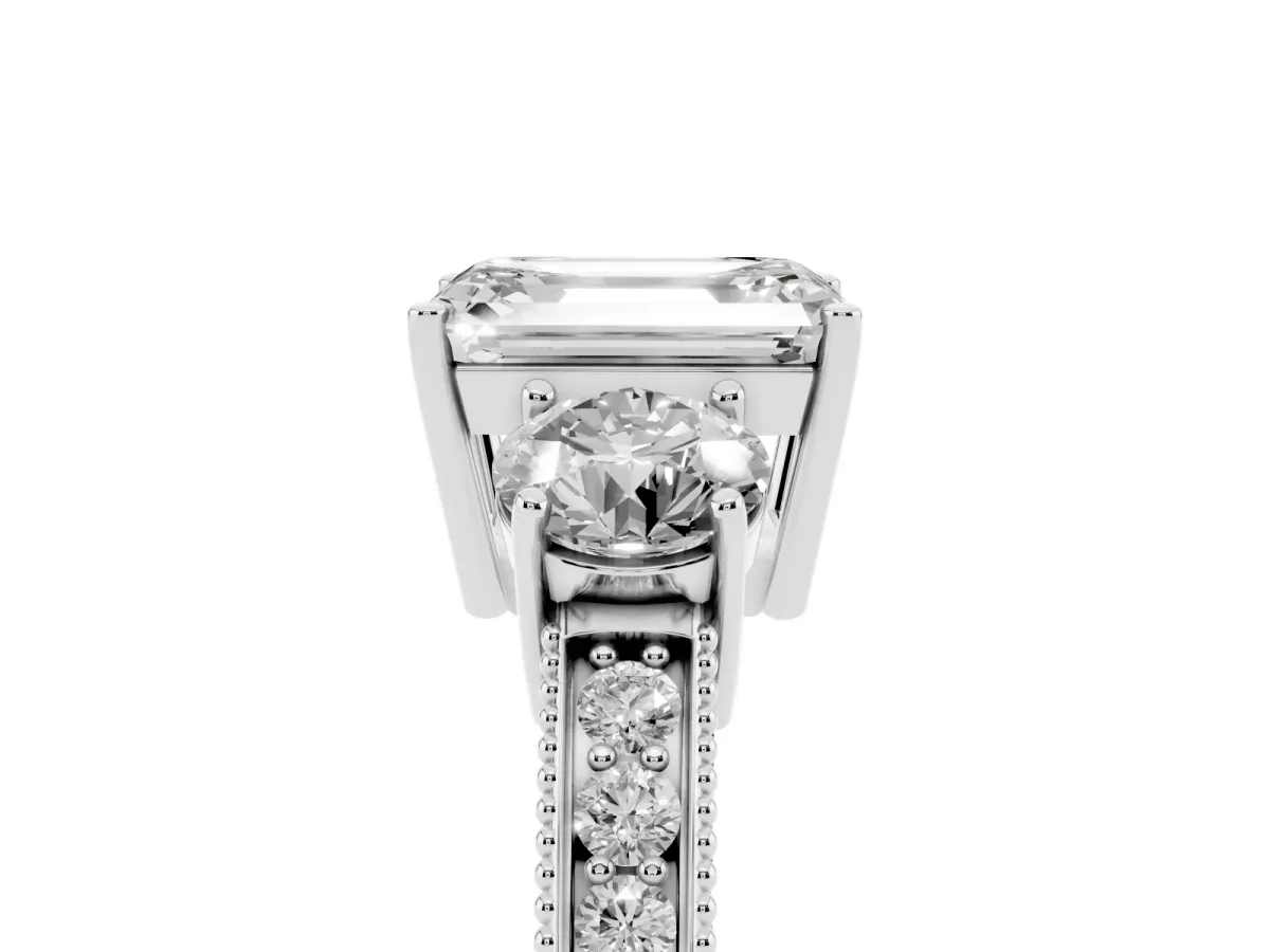 Emerald Cut Three-Stone Diamond Ring with Pavé Band and Four-Prong Setting Silver