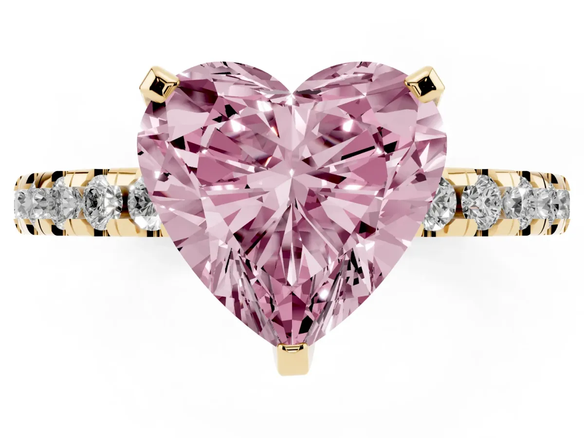 Fancy Pink Heart Cut Diamond Solitaire Ring with Round Pavé Band and Four-Prong Setting Yellow gold