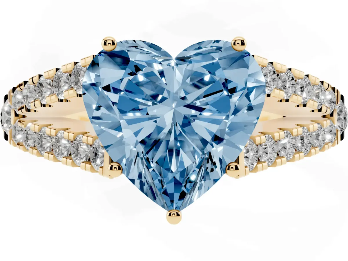 Fancy Blue Heart Cut Diamond Split Shank Engagement Ring with Round Pavé and Prong Setting Yellow gold