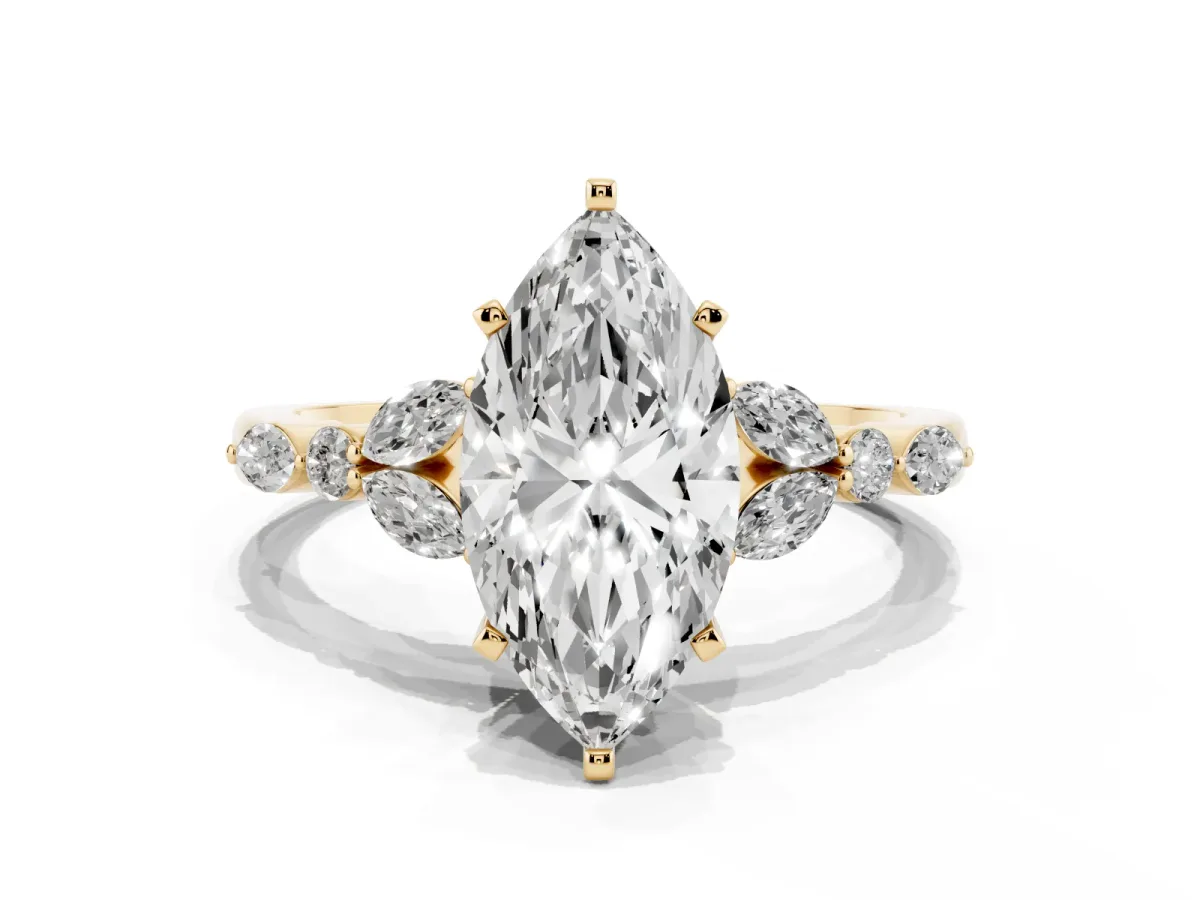 Marquise Cut Diamond Solitaire Ring with Side Stones and Four-Prong Setting Yellow gold
