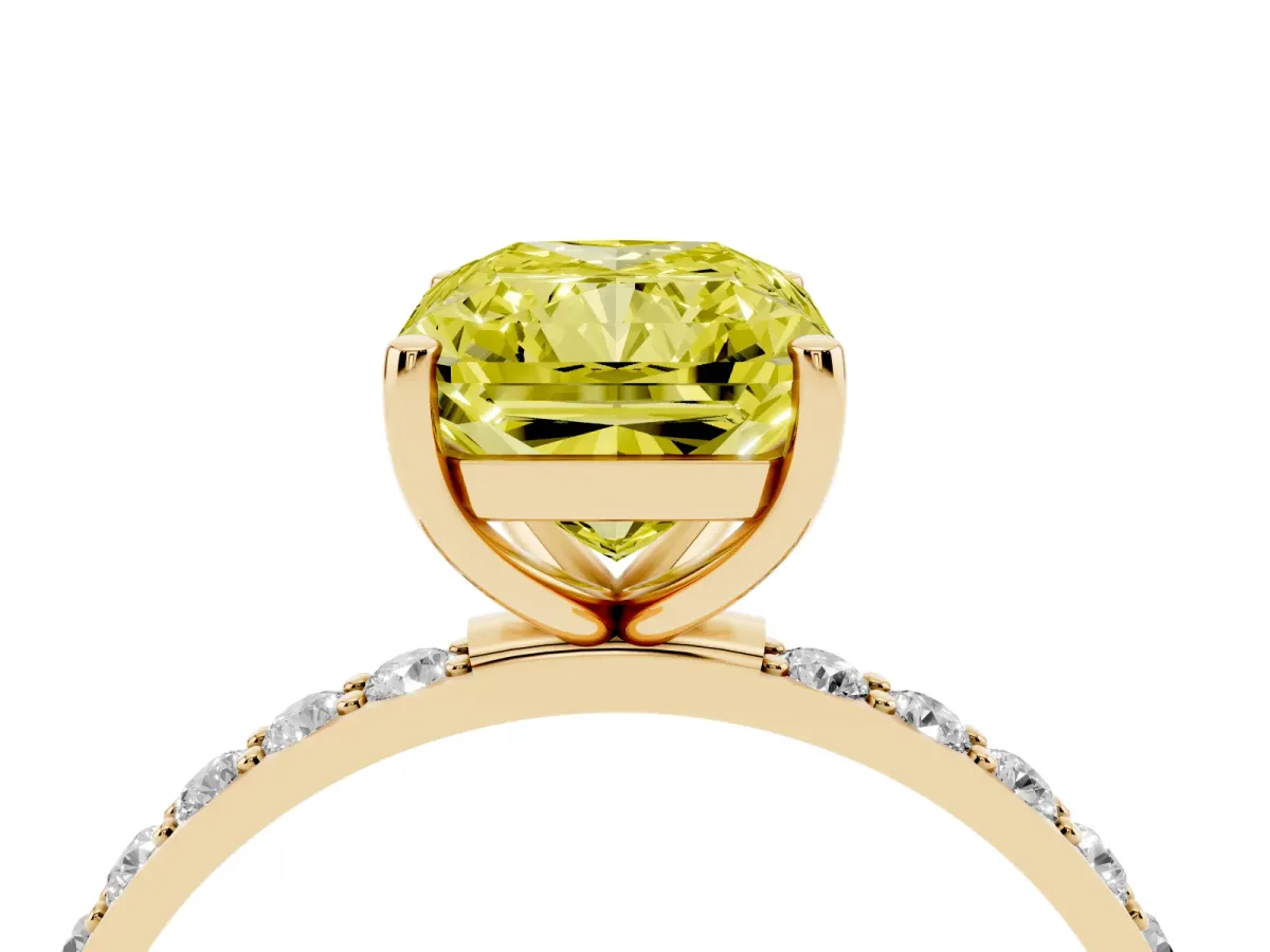 Fancy Yellow Radiant Cut Diamond Solitaire Ring with Round Pavé Shoulders and Prong Setting Yellow gold