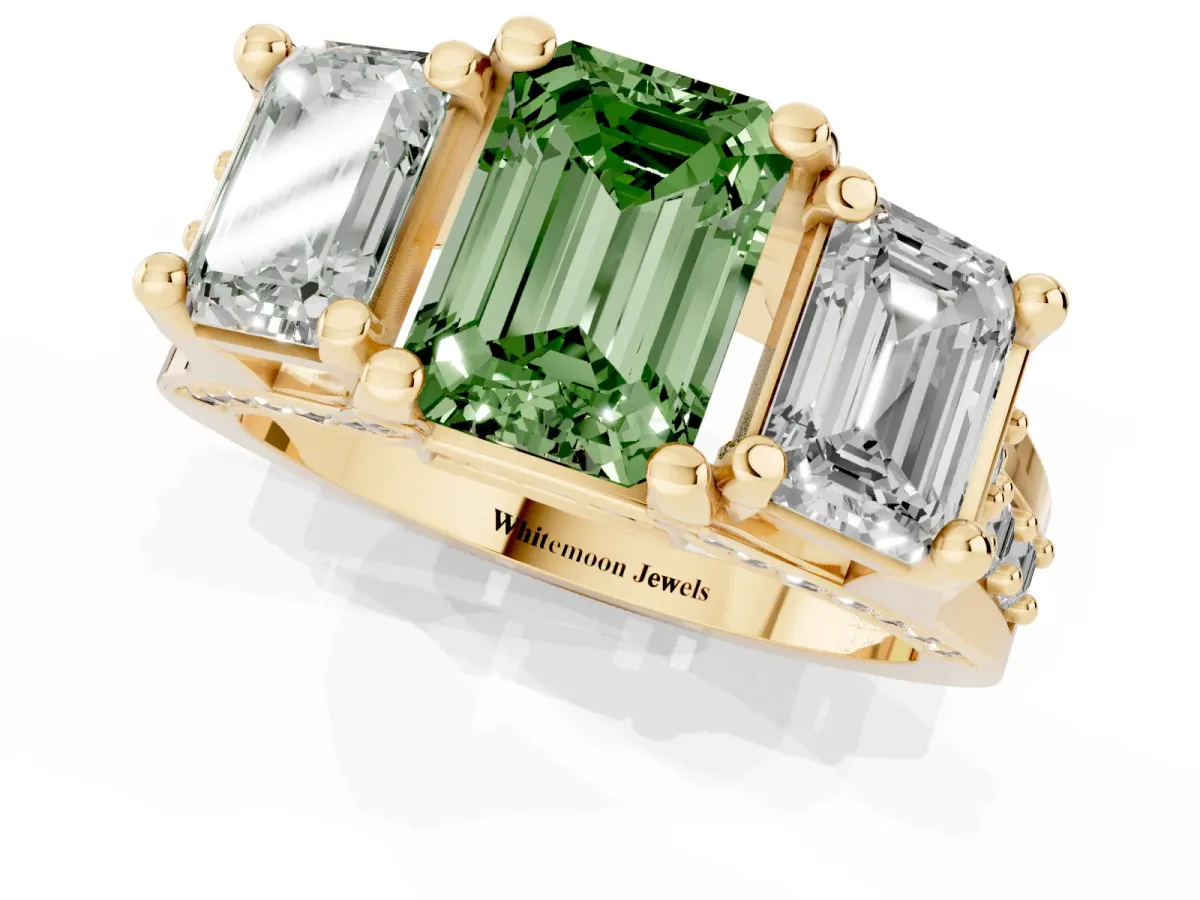 Fancy Green Emerald Cut Diamond Three-Stone Ring with Channel Set Band and Four-Prong Setting Yellow gold