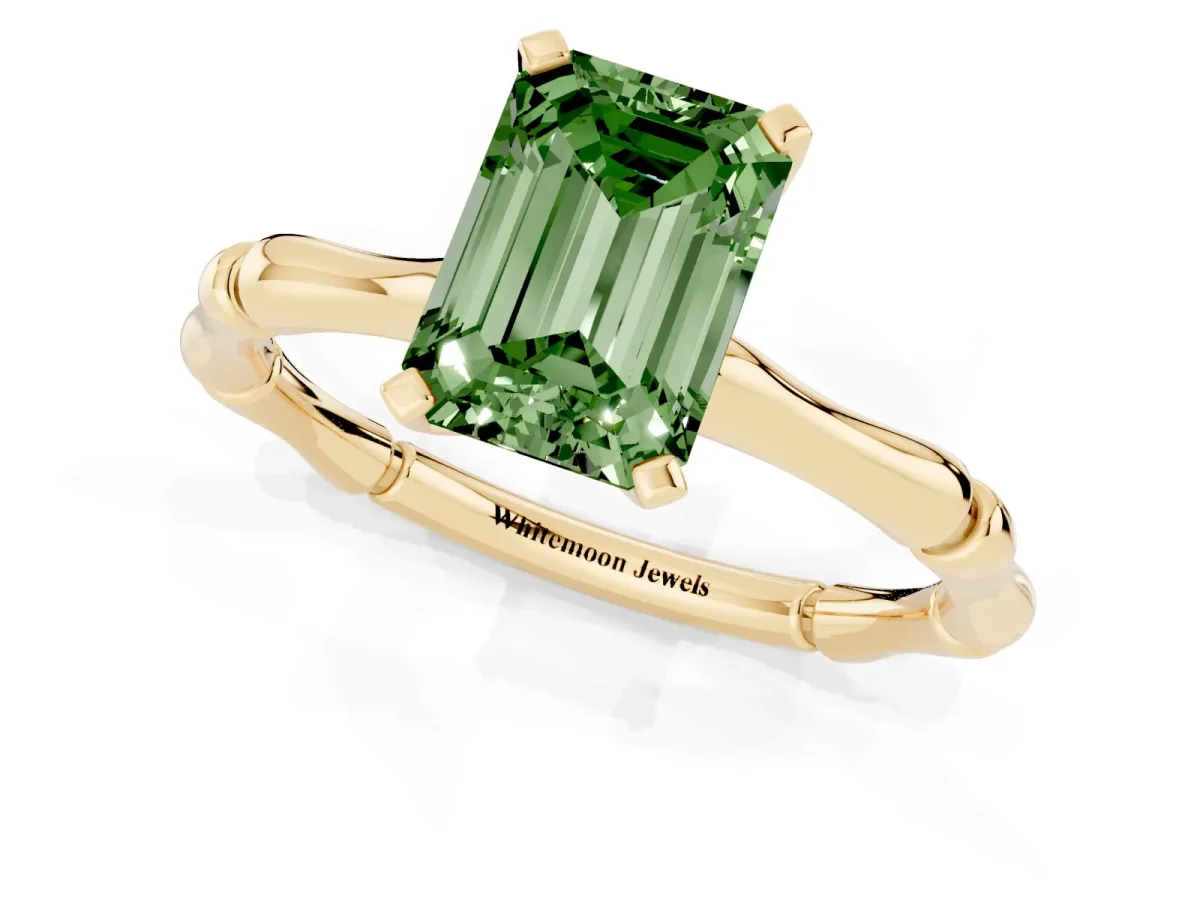 Fancy Green Emerald Cut Solitaire Diamond Ring with Bamboo Band and Four-Prong Setting Yellow gold