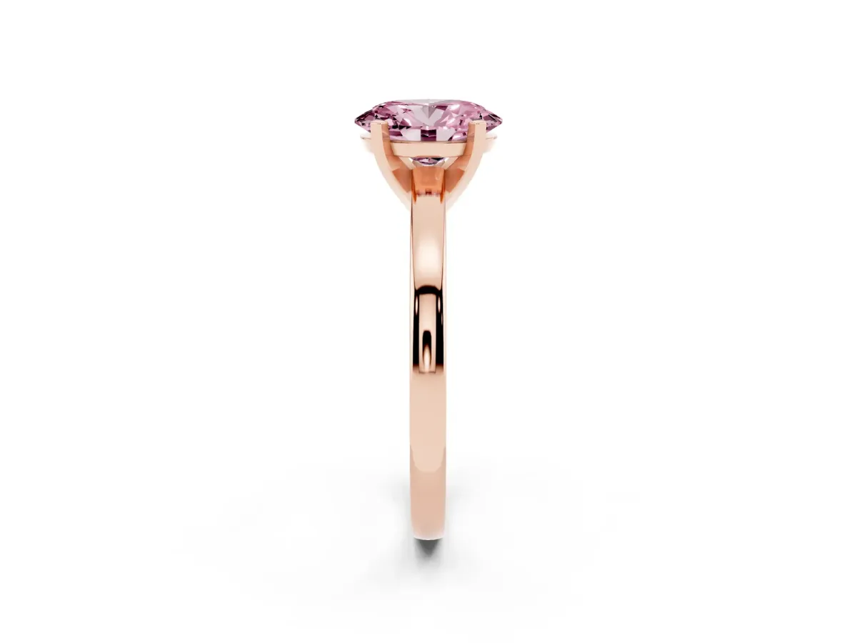 Fancy Pink Oval Cut Solitaire Diamond Engagement Ring with Four-Prong Setting on a Classic Band Rose gold