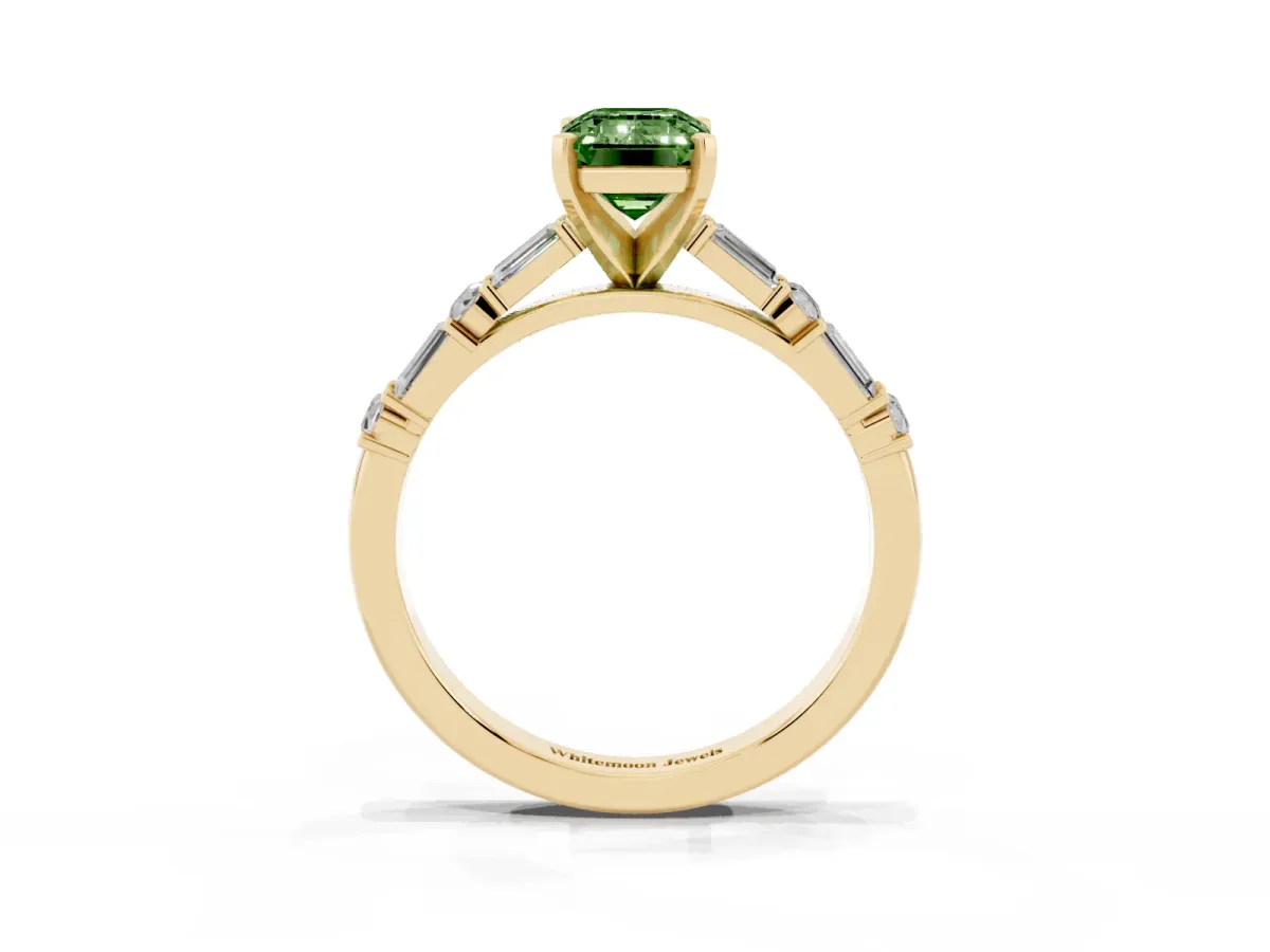 Fancy Green Emerald Cut Diamond Solitaire with Side Baguettes and Channel Set Band Yellow gold