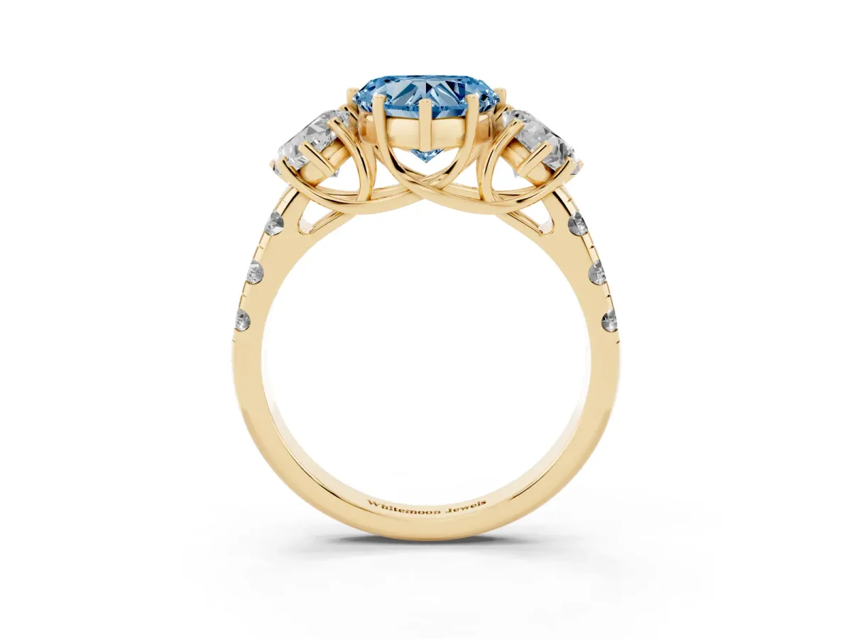 Fancy Blue Three-Stone Heart Cut Diamond Pavé Band with Prong Setting Yellow gold