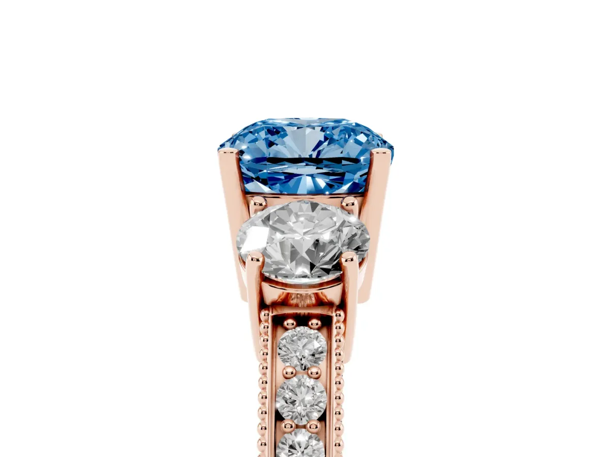 Fancy Blue Cushion Cut Three-Stone Diamond Ring with Pavé Band and Four-Prong Setting Rose gold