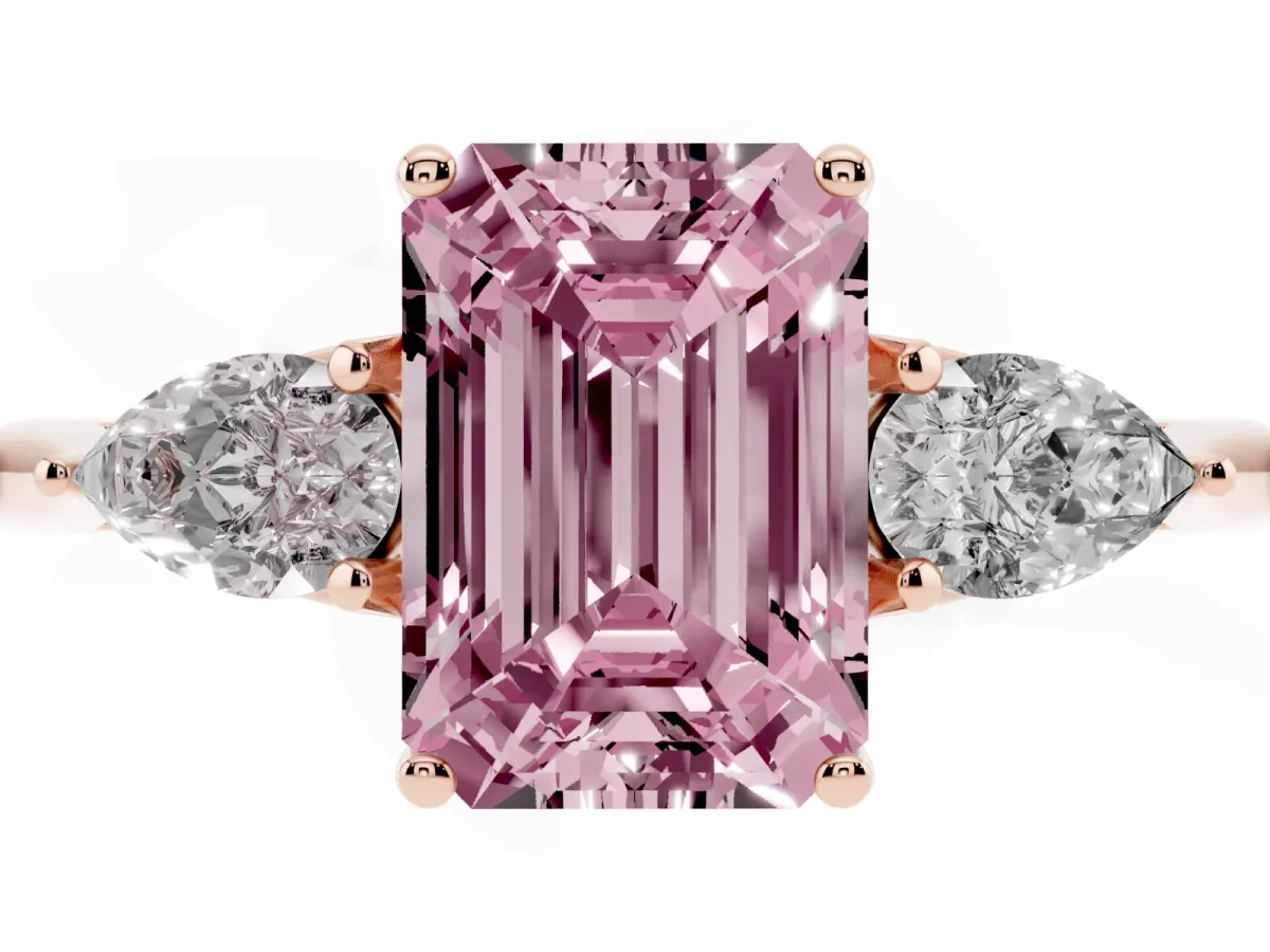 Fancy Pink Three-Stone Emerald Cut Diamond Ring with Pear Side Stones in Four-Prong Setting Rose gold