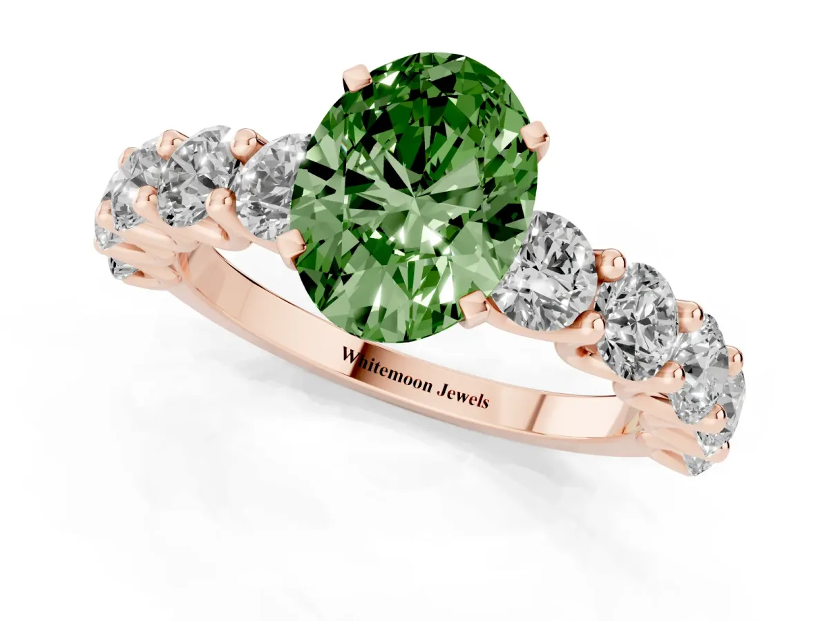 Fancy Green Oval Cut Diamond Prong Setting with Side Stones on a Pave Band Rose gold