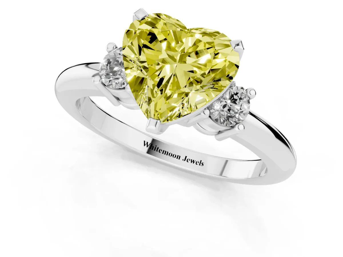Fancy Yellow Three-Stone Heart Cut Cut Diamond Solitaire with Prong Setting and Classic Band Silver